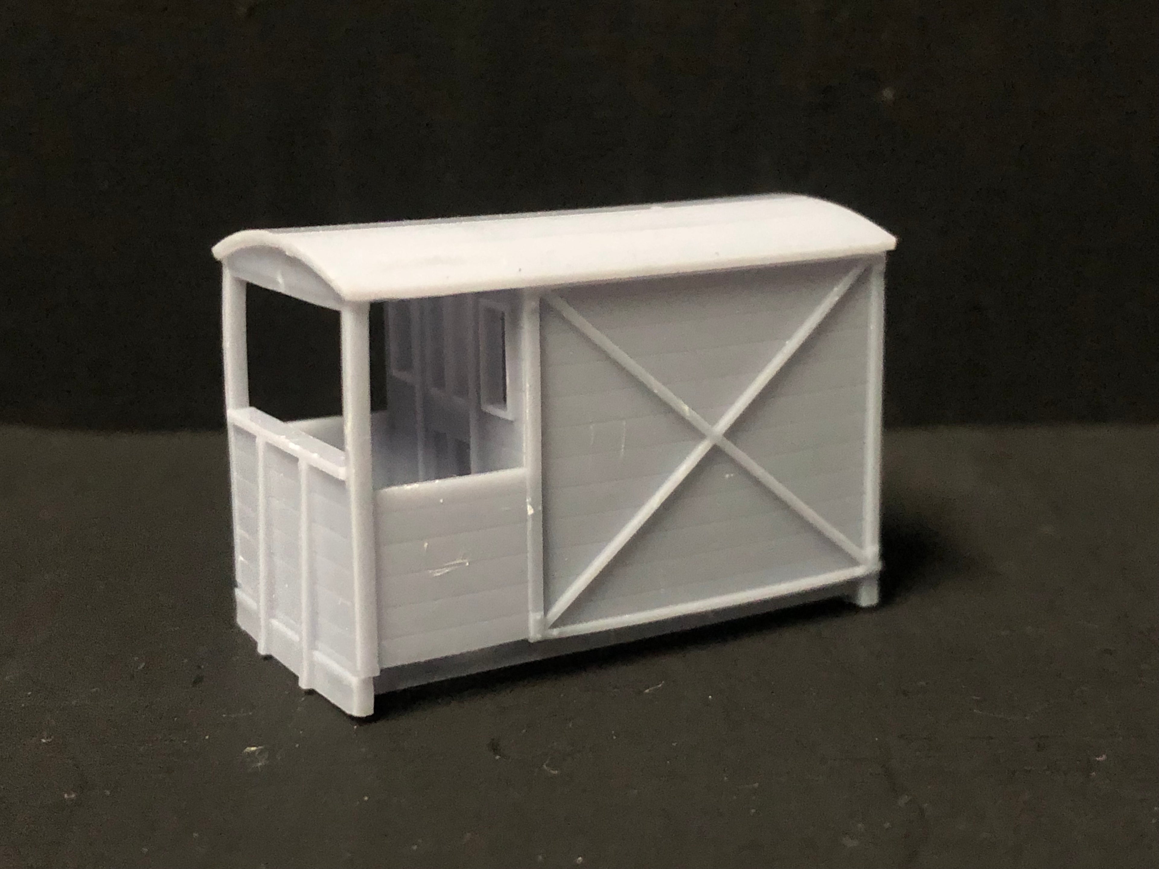 OO9 narrow gauge resin guards van body kit shown fitted to a Peco NR-121D 10ft wheelbase chassis for model railways