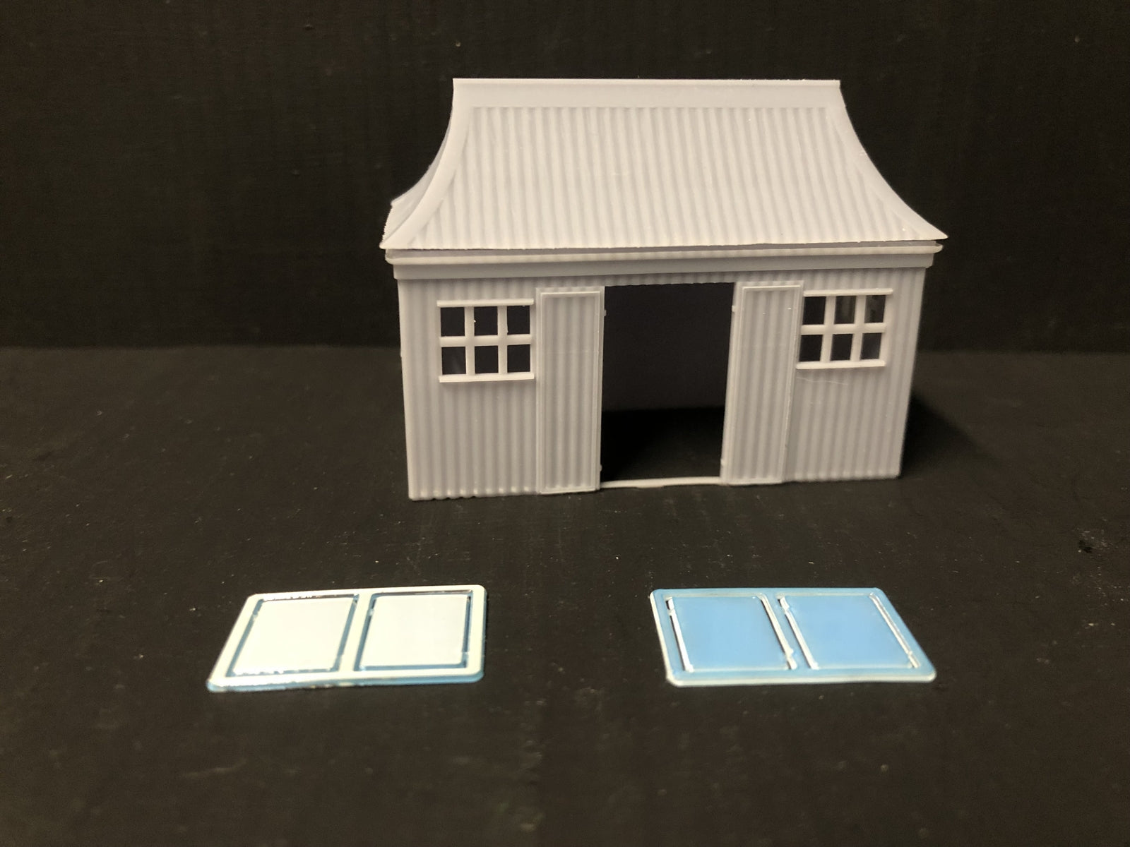 OO9/OO/HO scale GWR pagoda-style waiting room kit with open doors and glazing, based on the Glyndyfrdwy station building