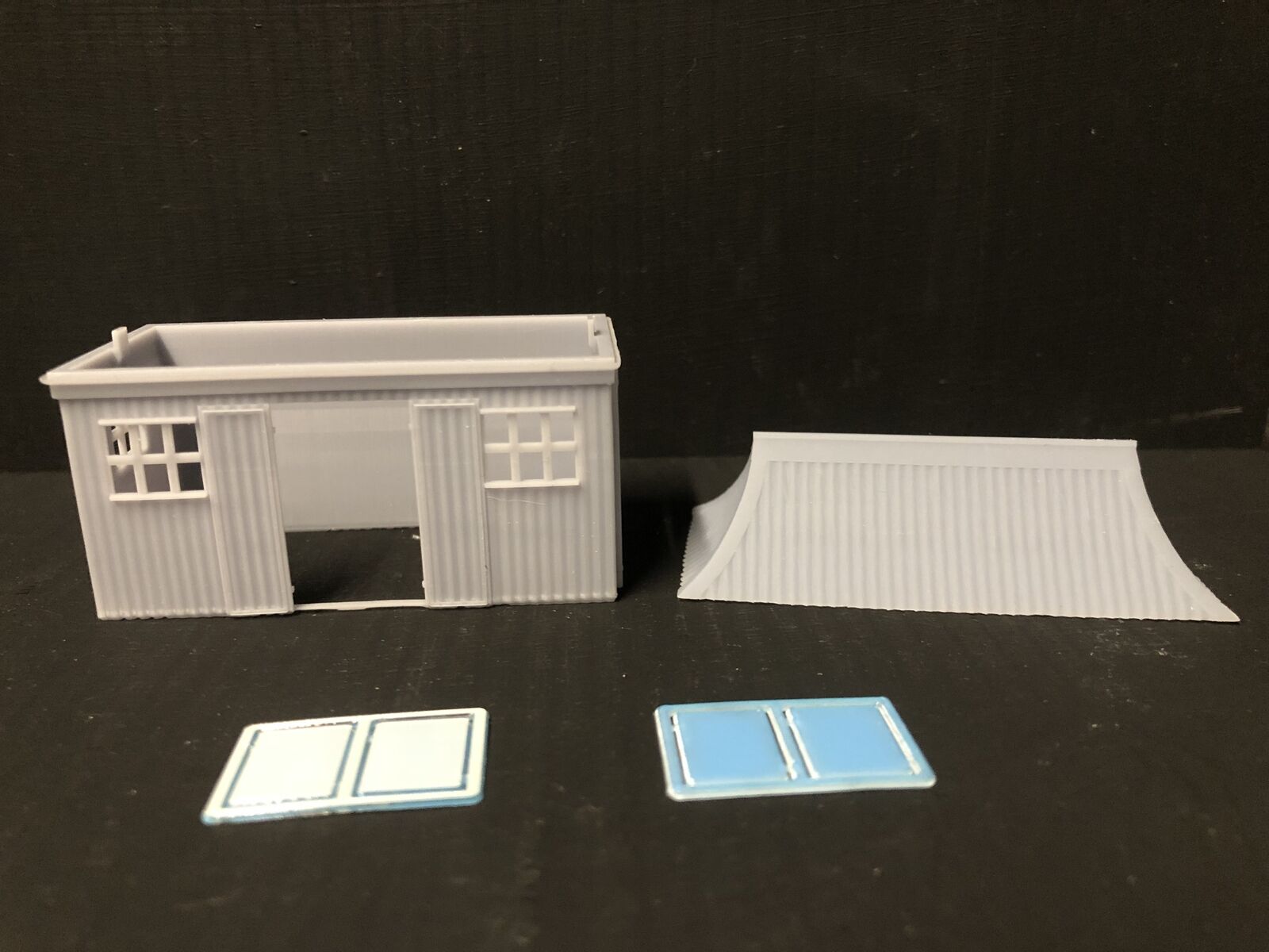 OO9/OO/HO scale GWR pagoda-style waiting room kit with open doors and glazing, based on Glyndyfrdwy station building