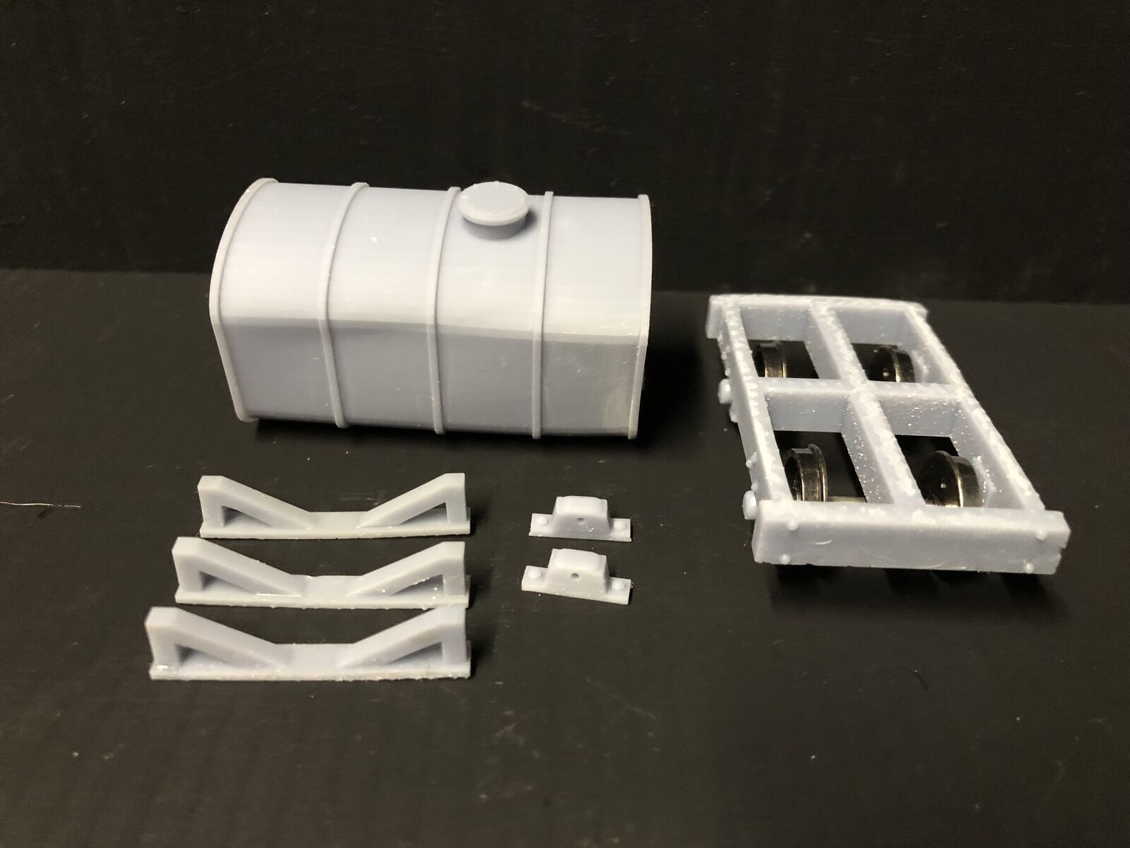 Gn15 narrow gauge diesel tanker wagon model with single fuel tank on bogie frame and 12.5mm spoked wheels