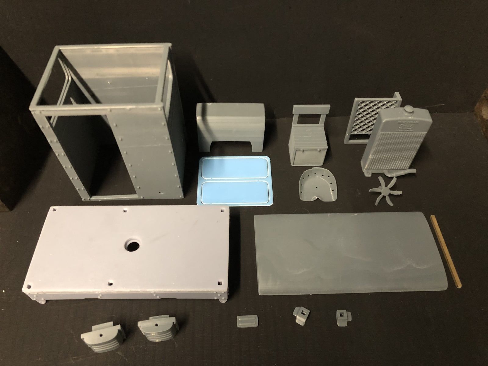Unpainted GN15 Simplex caravan diesel loco kit in G scale for 00 track, shown on a Tenshodo spud-style motor bogie chassis