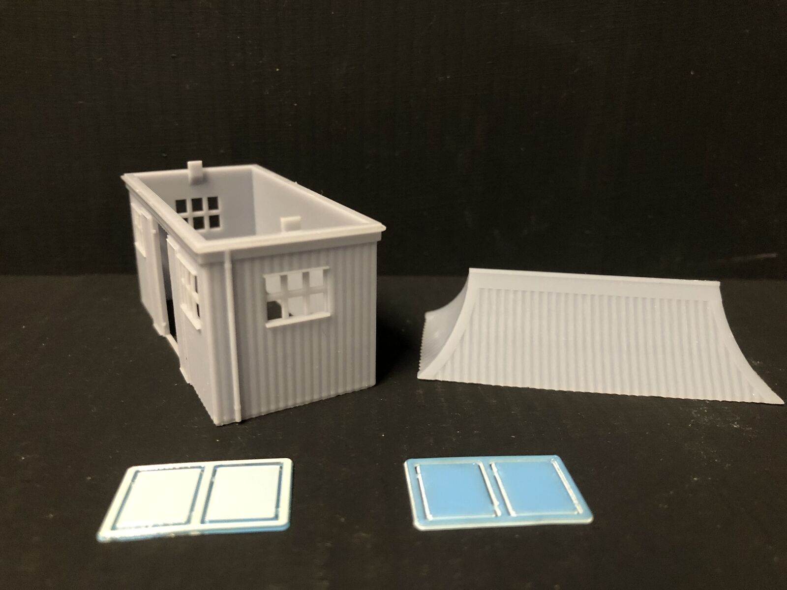 OO9/OO/HO scale GWR pagoda-style waiting room kit with open doors and glazing, based on Glyndyfrdwy station building