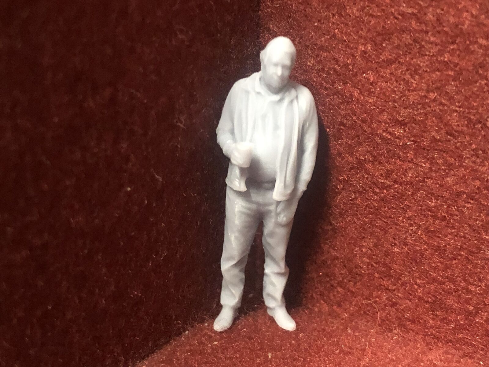 Set of six unpainted 1:43.5 scale NG7/O gauge worker and civilian figures in assorted standing and walking poses.