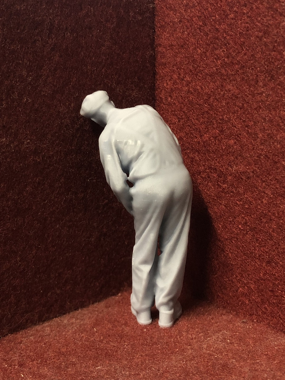 Unpainted G-scale 1:22.5 driver figure model, 3D scanned from a real person, posed peering ahead for GN15 layouts.