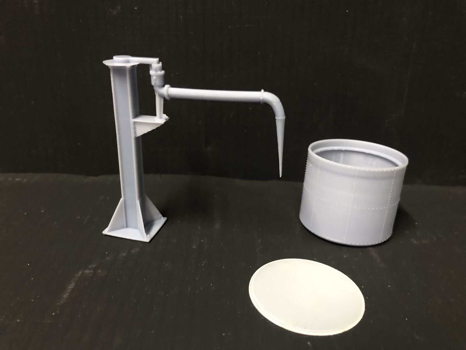 OO9 gauge GWR-style Buckfastleigh-inspired water tower kit with elevated tank and tower stand for model railway layouts