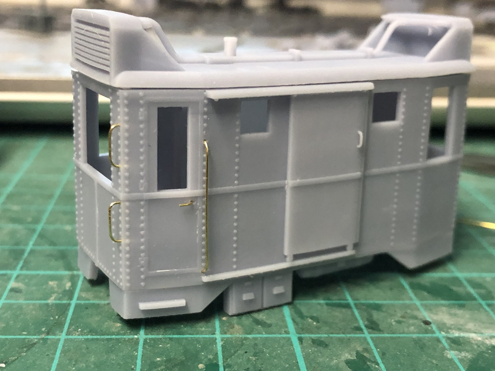 OO9 Ganz DMOT narrow gauge diesel locomotive body shell for Kato 11-109 chassis shown as an unpainted model kit