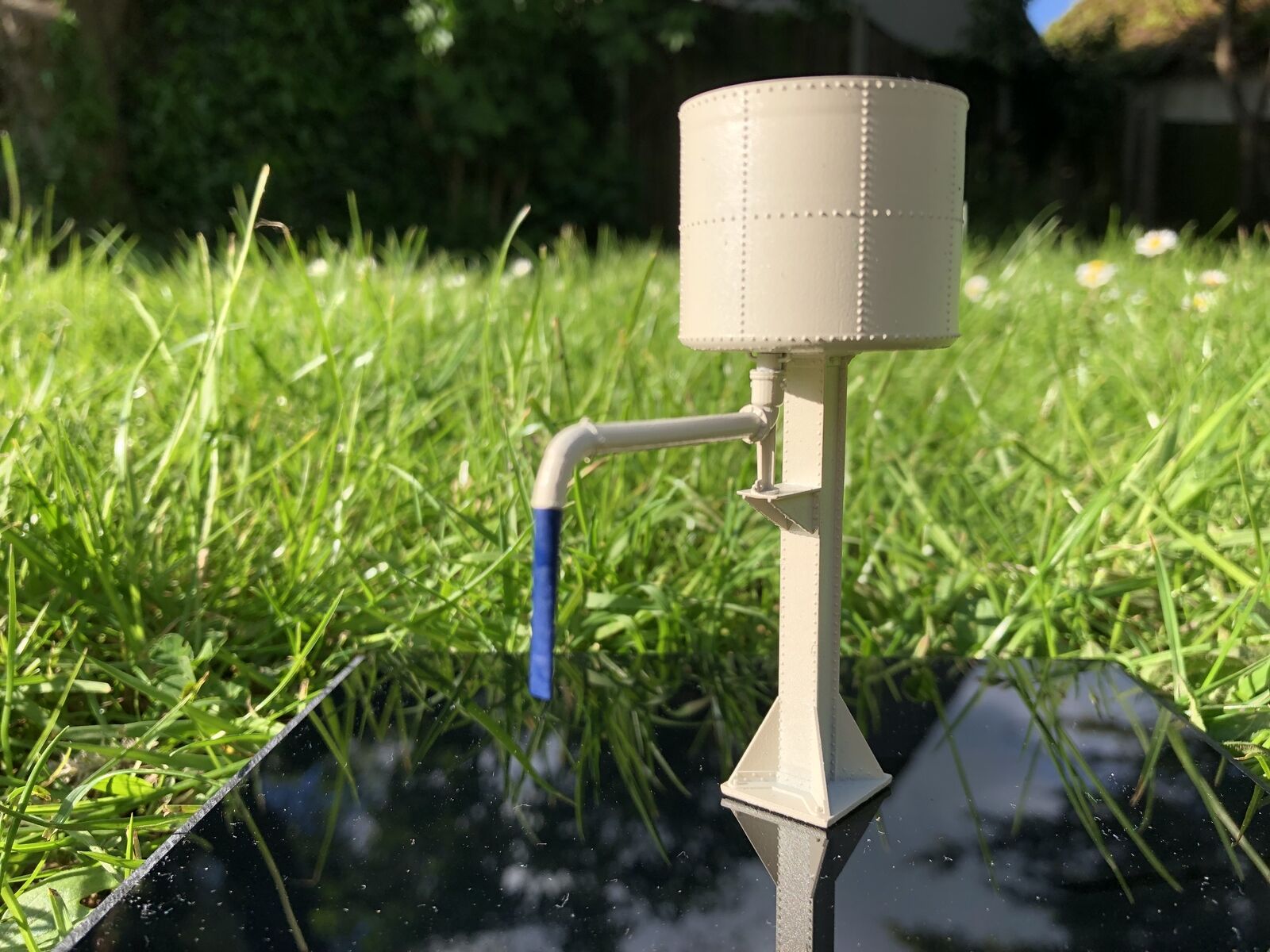 OO9 gauge GWR-style water tower kit based on Buckfastleigh, showing the elevated tank and tower stand for model railways