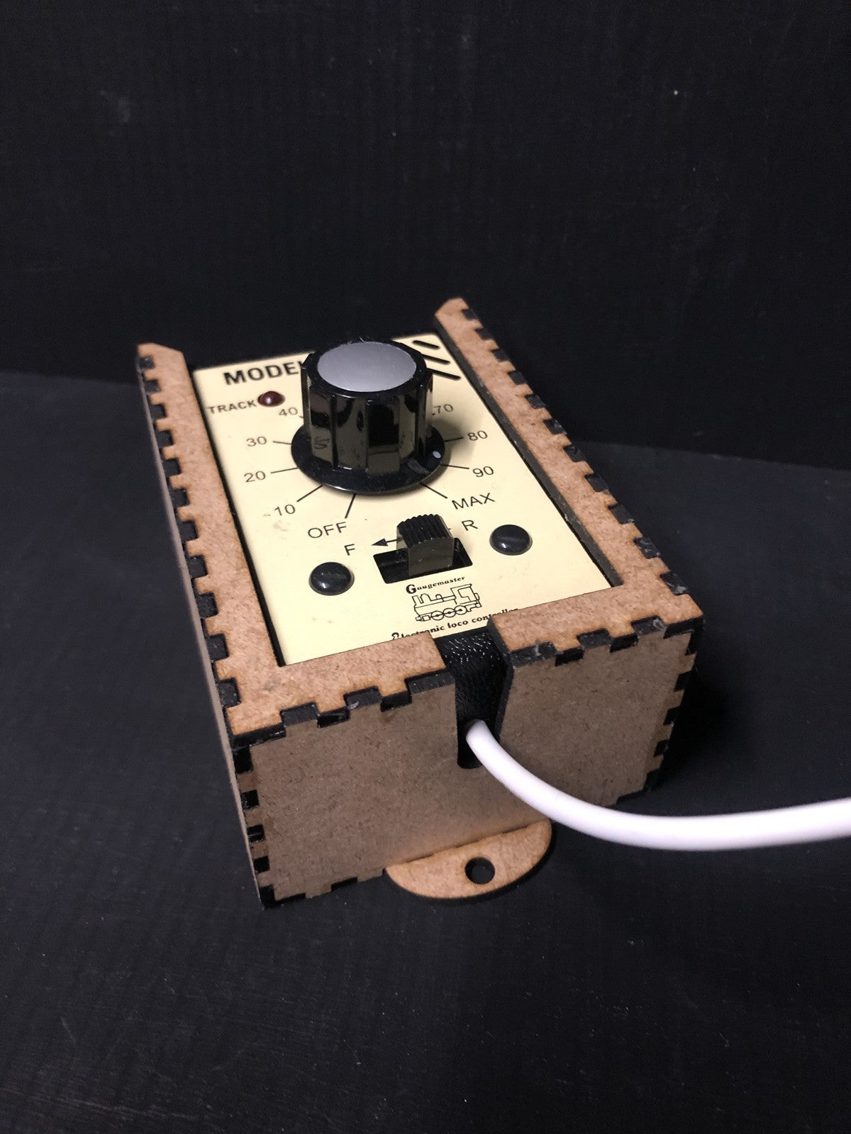 Plastic model railway caddy kit holding a GMC-W walkabout controller for layout control, suitable for OO/HO scale setups