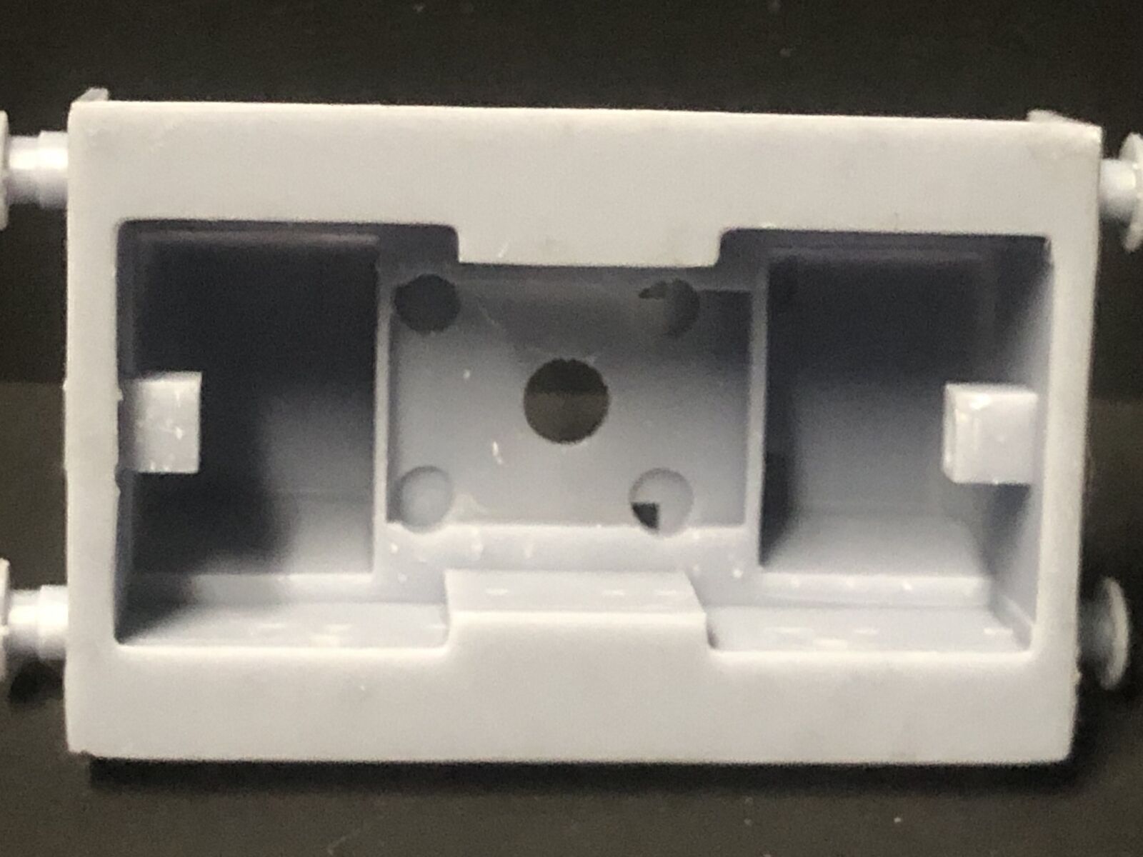 Unpainted OO9 Hunslet Yardmaster diesel shunter kit body shown fitted to a BD Concepts 28mm motor bogie chassis