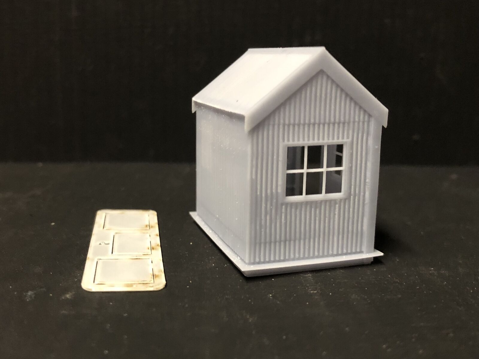 OO9 narrow gauge OO gauge Sylfaen station halt resin kit with glazed hut, shown assembled and painted in 4mm scale.