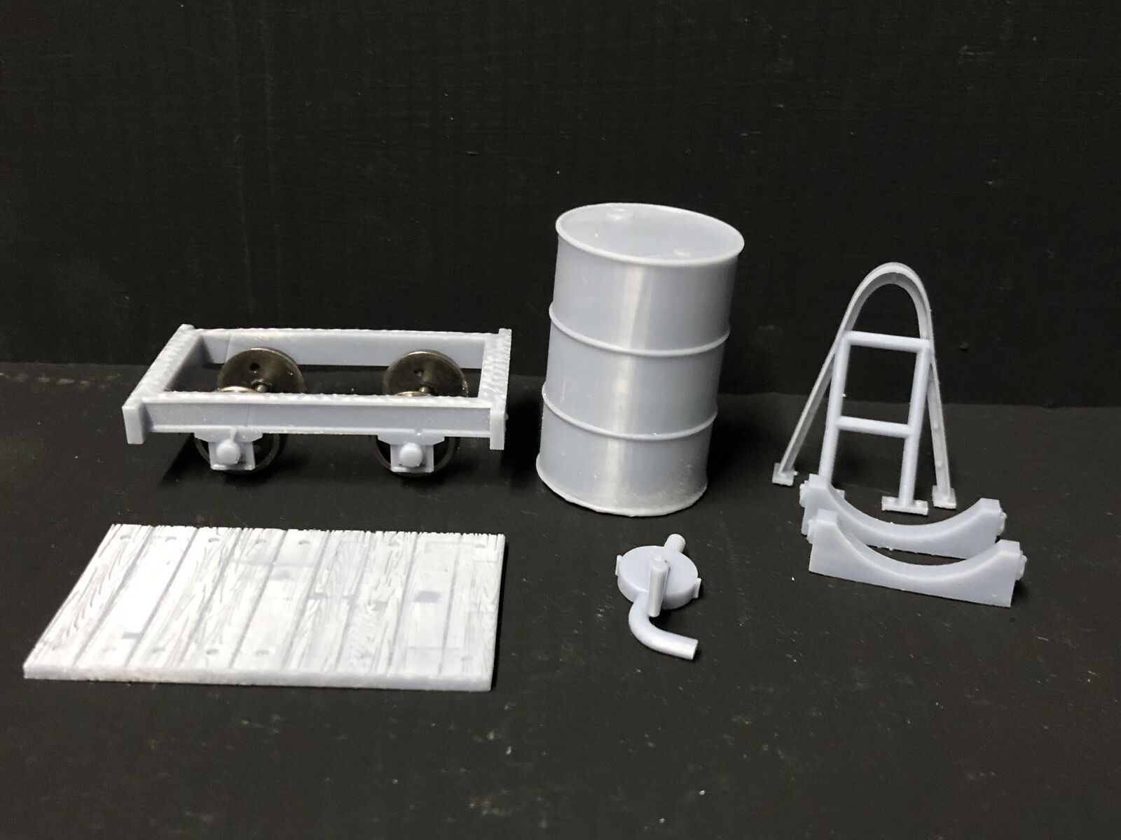Gn15 narrow gauge petrol bowser wagon kit with single drum, pump frame and 12.5mm spoked wheels for model railway layouts