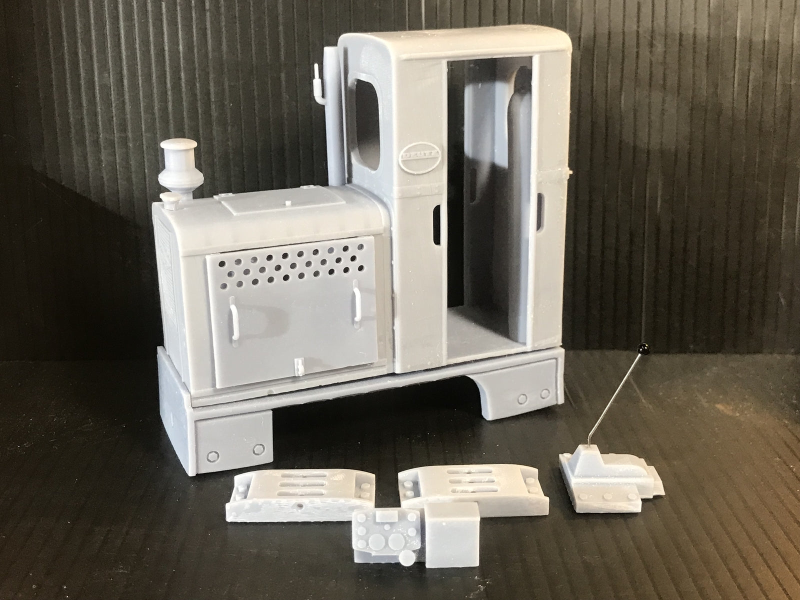 Unpainted GN15 Deutz OMZ 117 diesel critter kit body on G-scale 00 track, shown mounted on a Tenshodo spud chassis