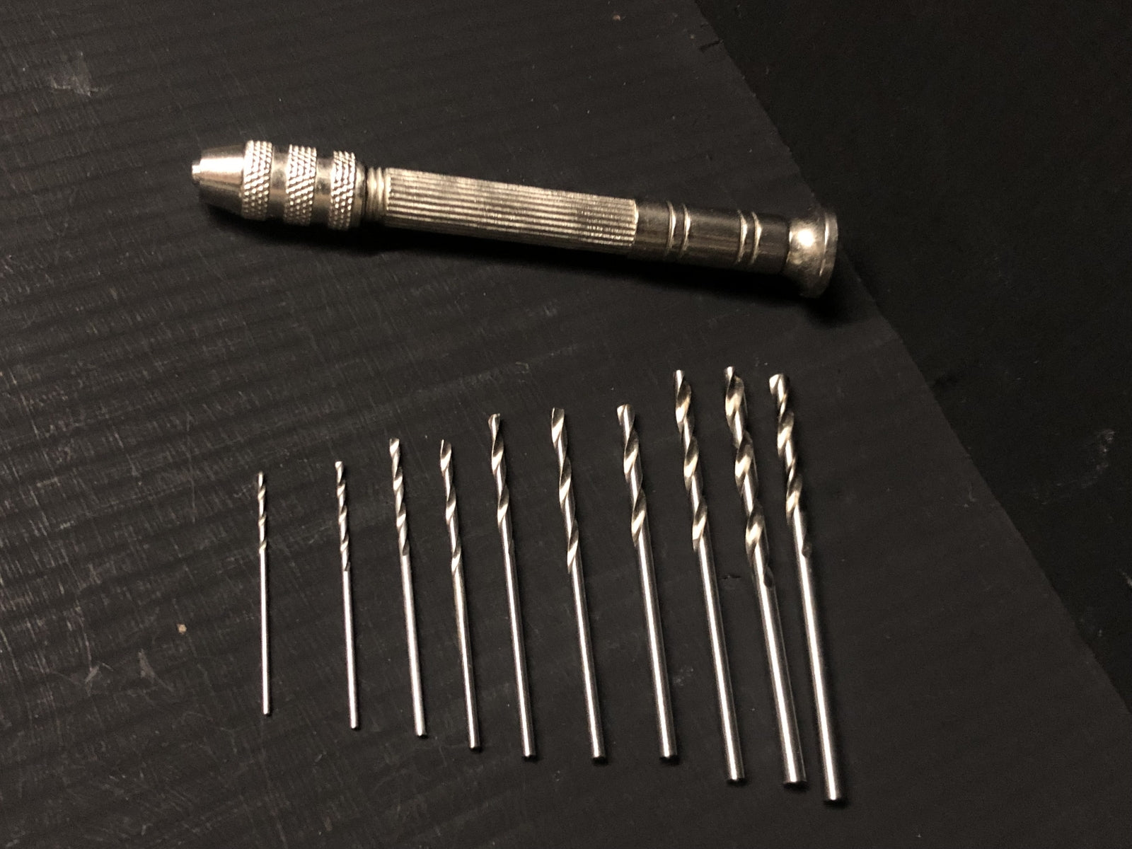 Pin vice drill holder set for railway modellers shown with reversible collets and assorted micro drill bits for fine detailing