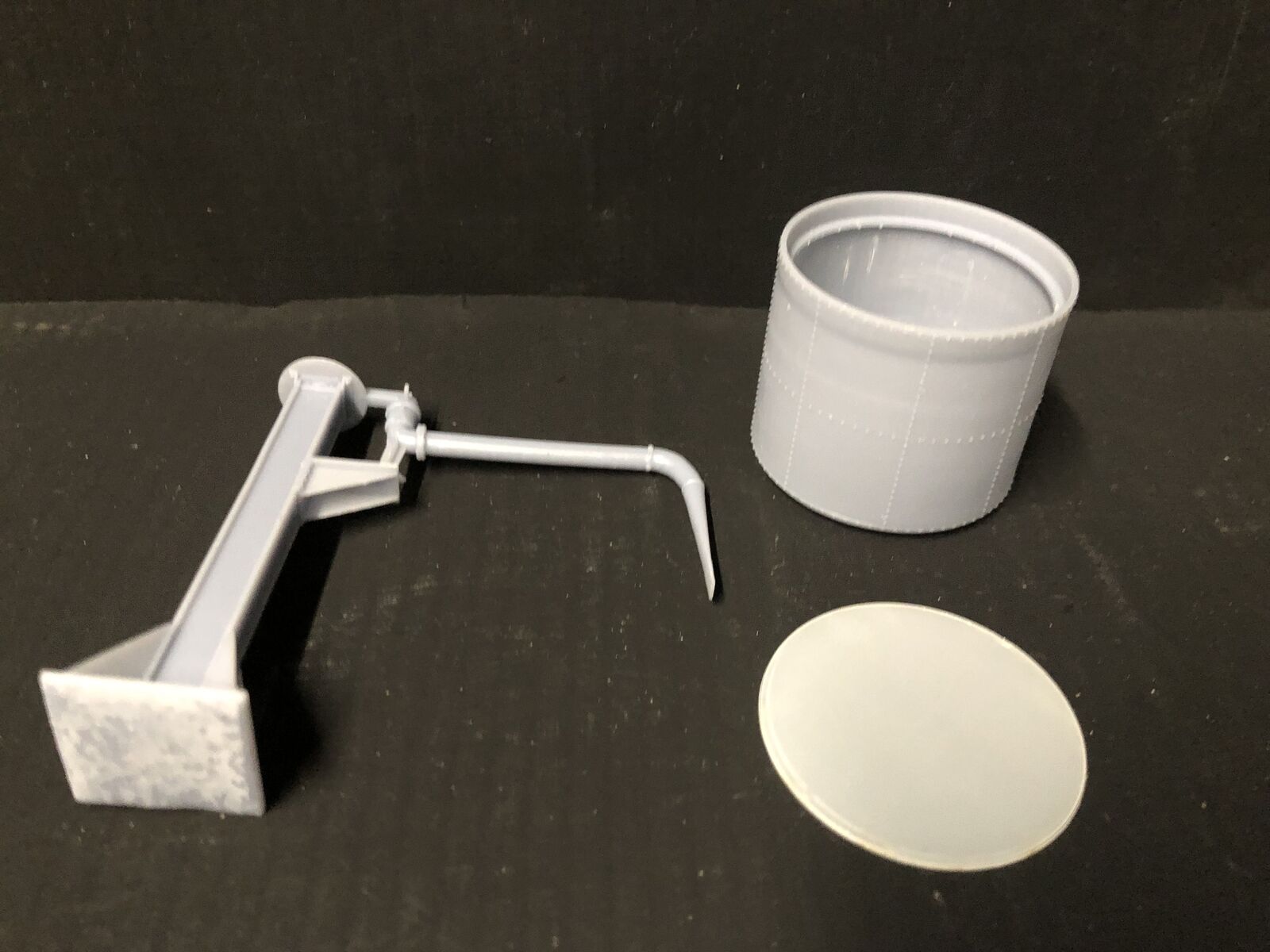 OO9 gauge GWR-style water tower kit based on Buckfastleigh, featuring elevated tank and tower stand for model railway layouts