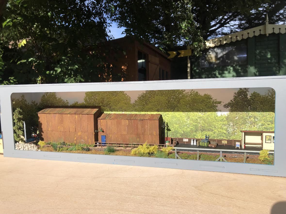 55cm shelf-mounted model railway diorama with track, optional fiddle stick and built-in LED lighting, suitable for OO/HO scale