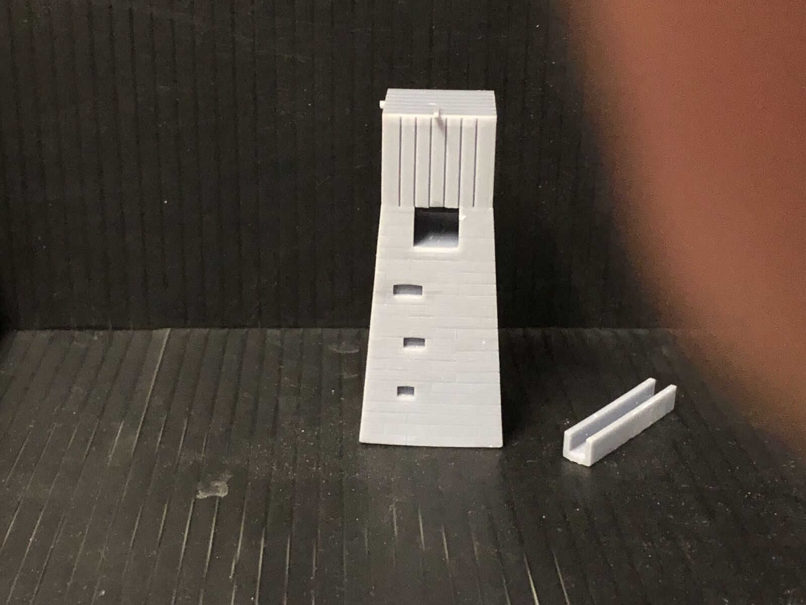 OO9 narrow gauge Dolgoch-style water tower kit with slate brick tower and top-mounted tank for OO gauge model railways