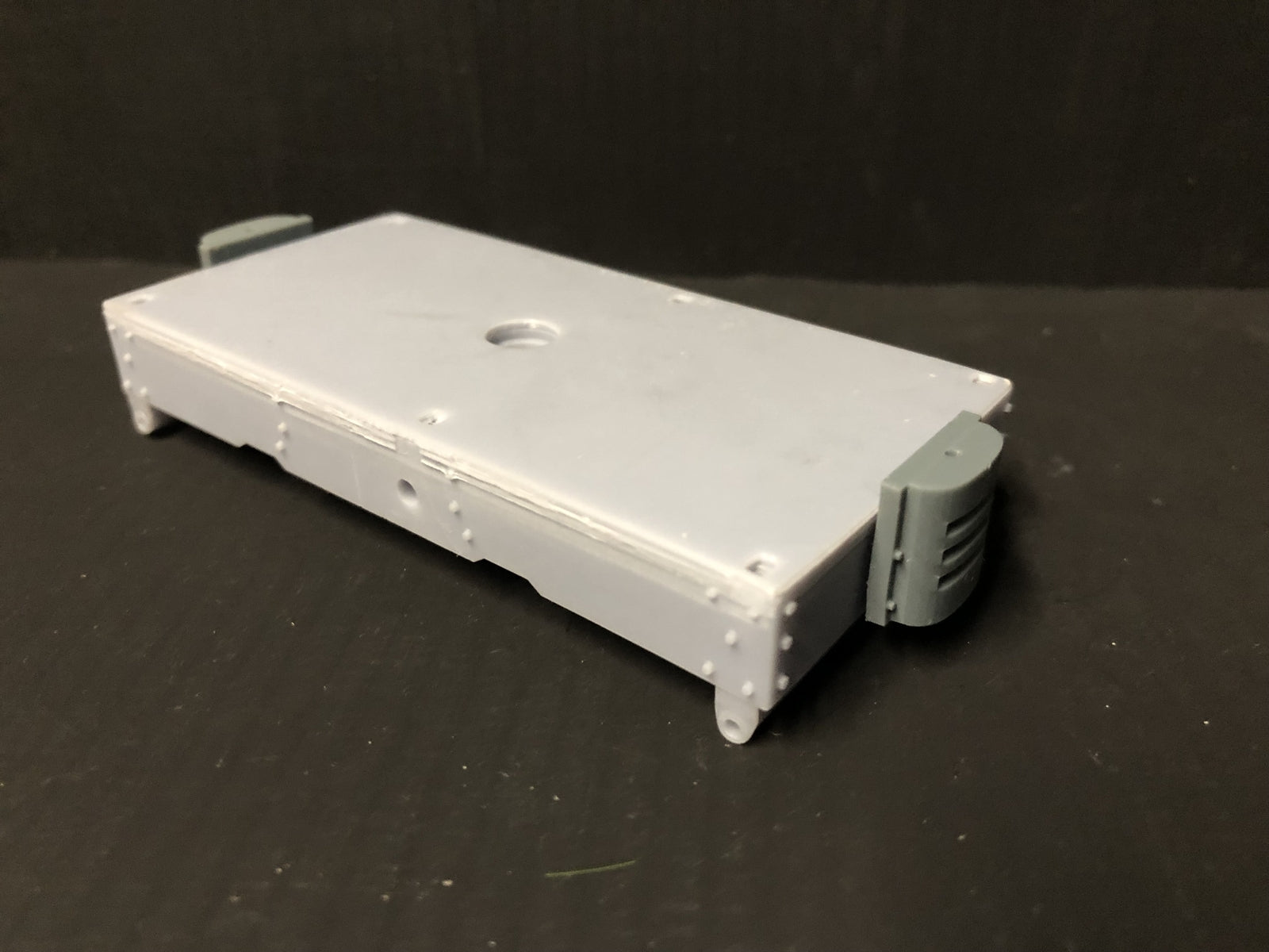 Unpainted GN15 Simplex caravan diesel loco kit in G scale for 00 track, shown on a Tenshodo spud-style motor bogie chassis