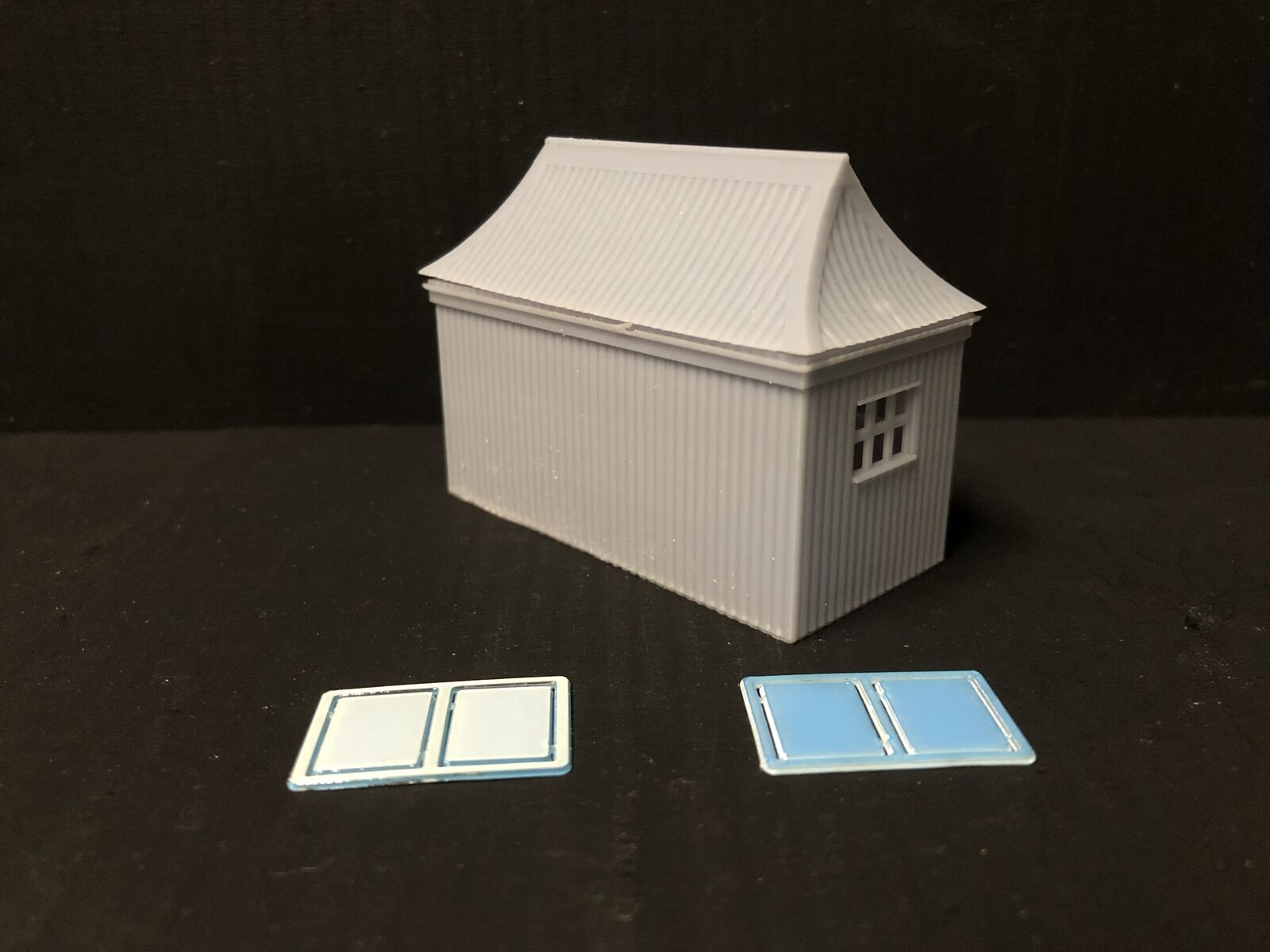 OO9/OO/HO scale GWR pagoda-style waiting room kit with open doors and glazing, based on Glyndyfrdwy station building
