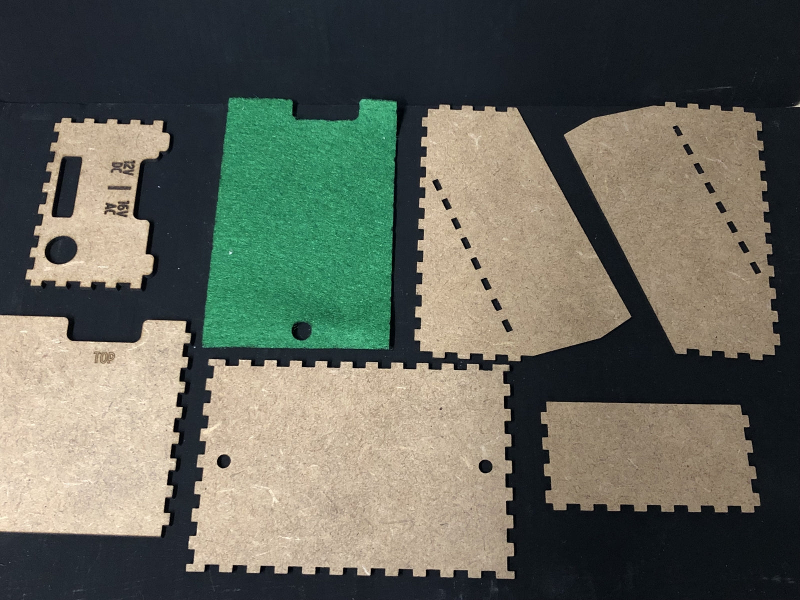 OO9 scale desktop caddy kit holding a Gaugemaster Combi model railway controller with cable cutouts and fixing holes