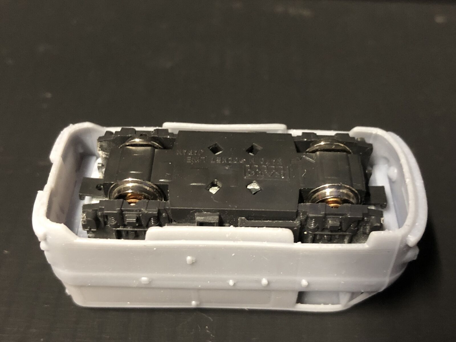 OO9 narrow gauge Commer van railcar kit body shown fitted to a shortened Kato 109 chassis for 4mm scale model railways