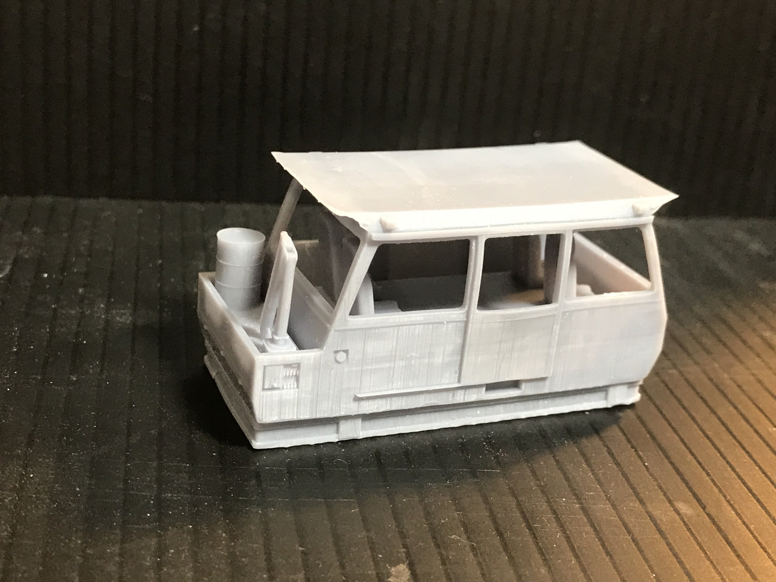 Unpainted OO9 narrow gauge Wickham inspection car kit body with interior for Kato 11-109 chassis, shown in resin detail.