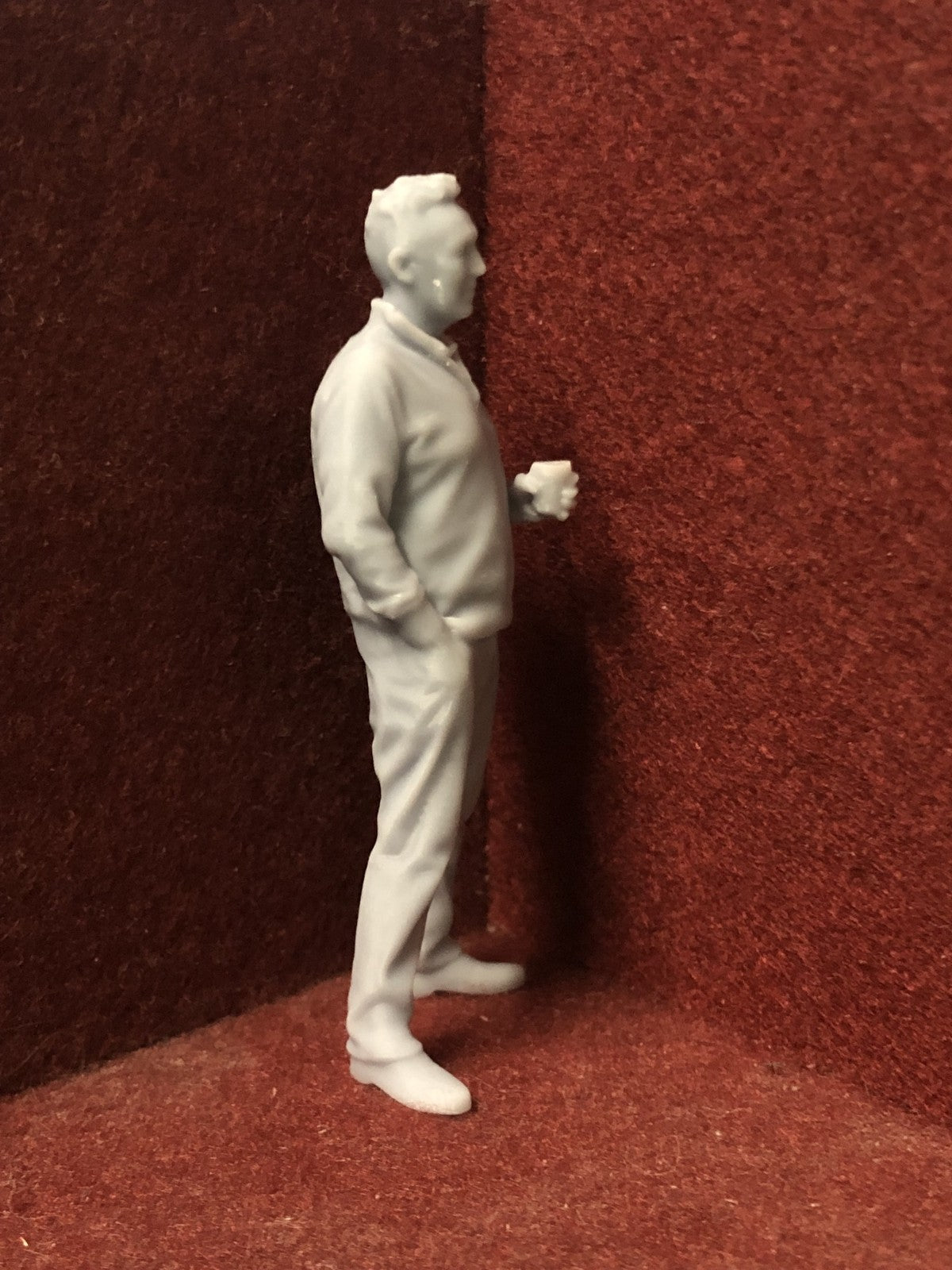 Unpainted G-scale 1:22.5 male figure holding a coffee cup, 3D scanned from a real person for model railway scenes