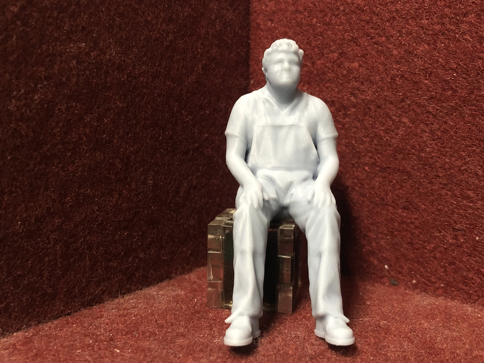 Unpainted 3D-printed seated driver figure in G scale 1:22.5, approx. 60mm tall, suitable for GN15 model railway layouts