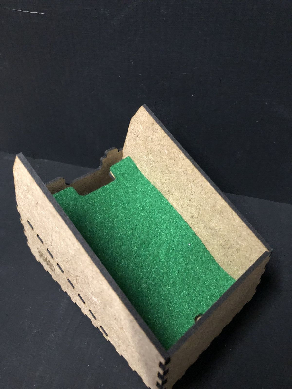 OO9 scale desktop caddy kit holding a Gaugemaster Combi model railway controller with cable cutouts and fixing holes