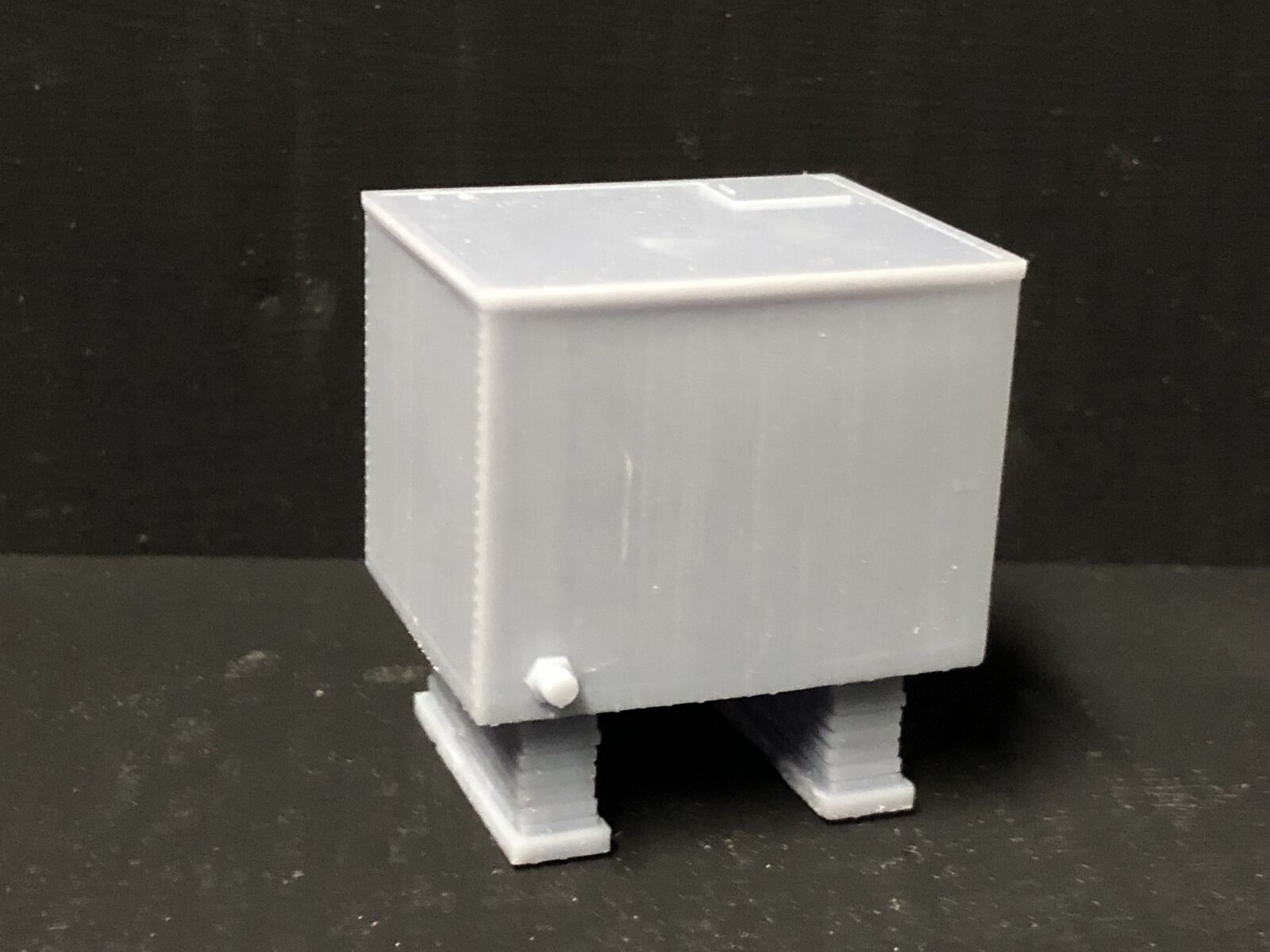 OO/HO/OO9 gauge model railway kit with two unpainted storage tanks on brick supports for depot or yard scenes