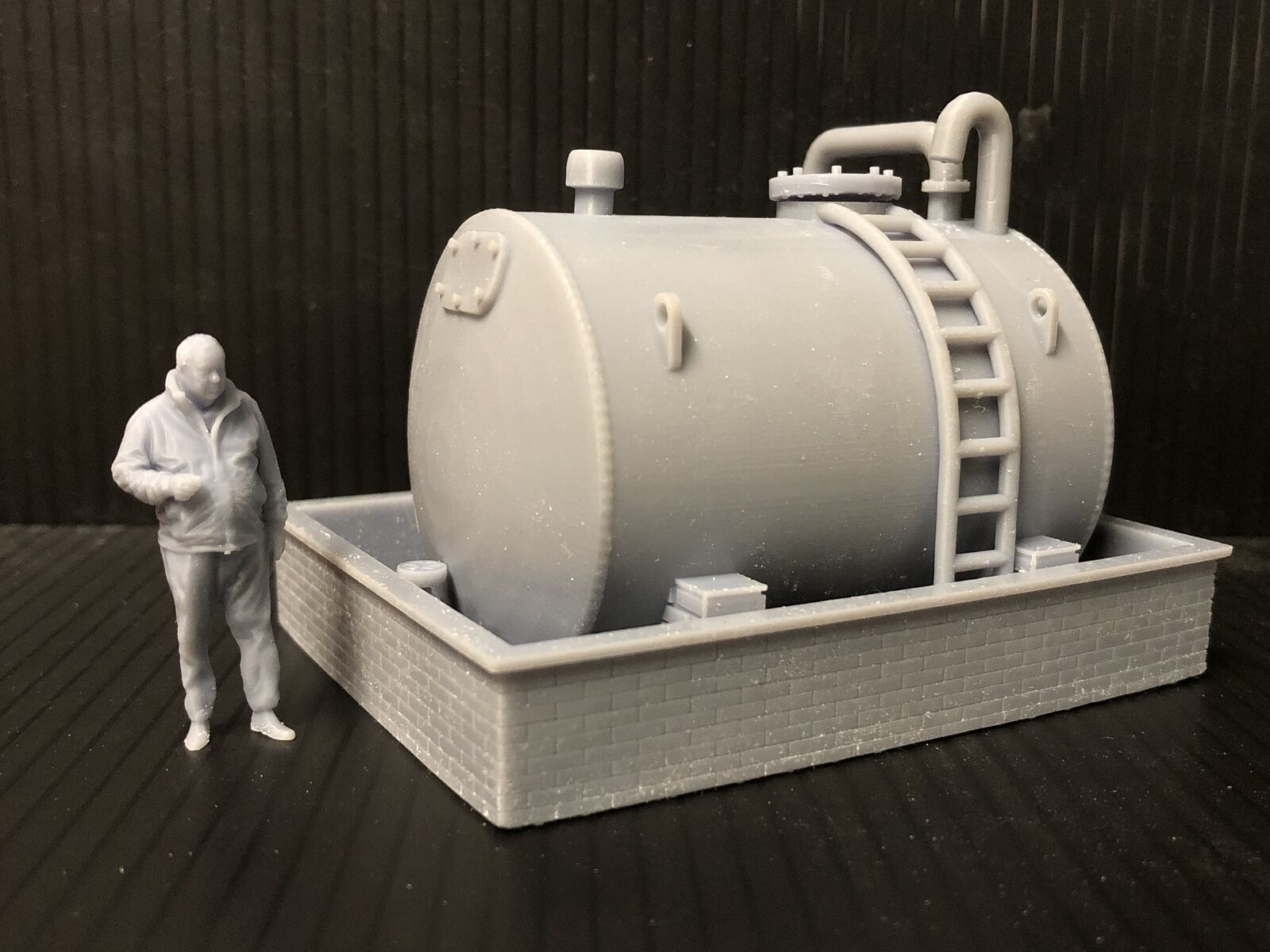 O / O16.5 7mm gauge diesel oil tank on brick supports with bund wall, ladder, pipework and figure for depot or yard scenes