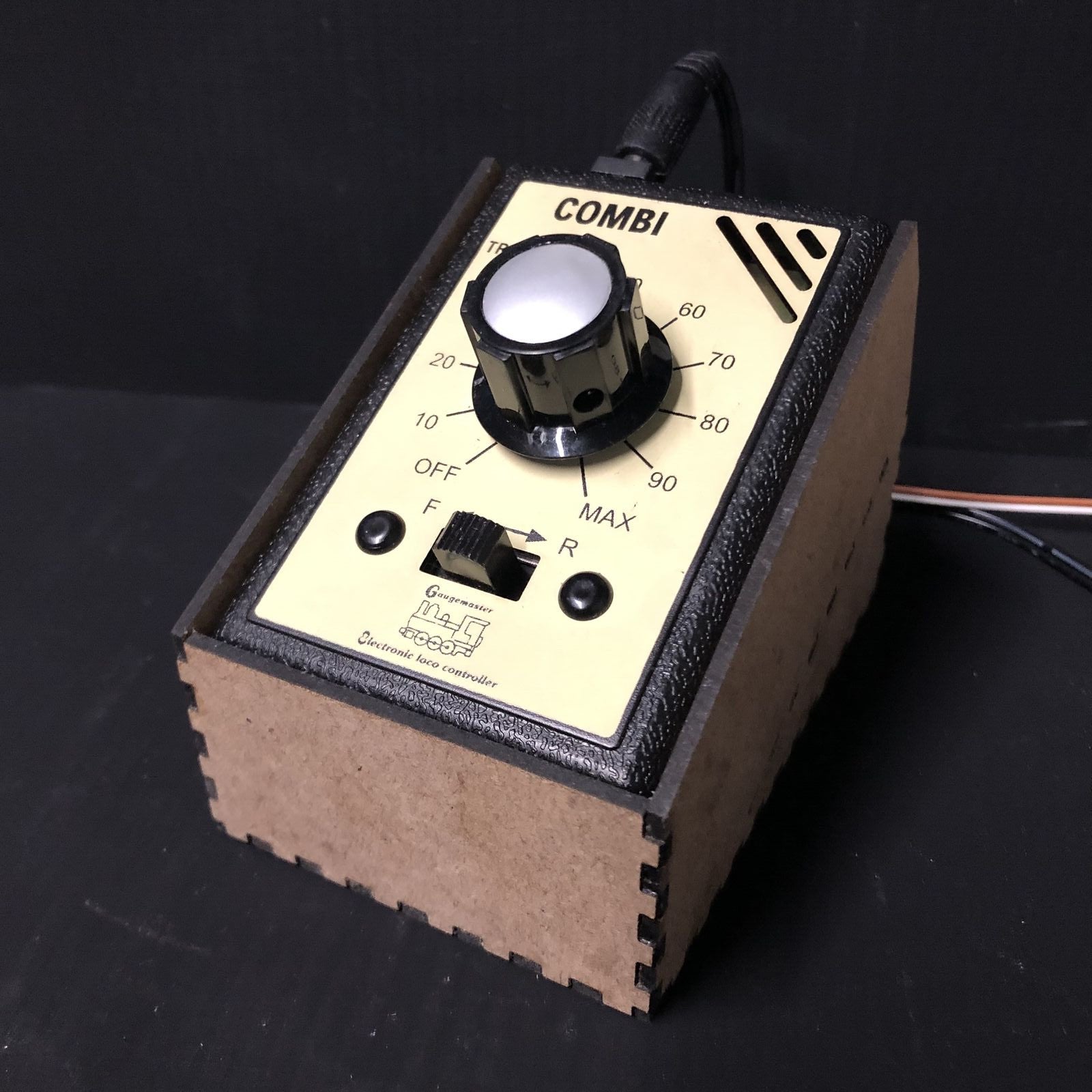 Desktop caddy kit for a Gaugemaster Combi model railway controller, suitable for OO9 narrow gauge layouts.