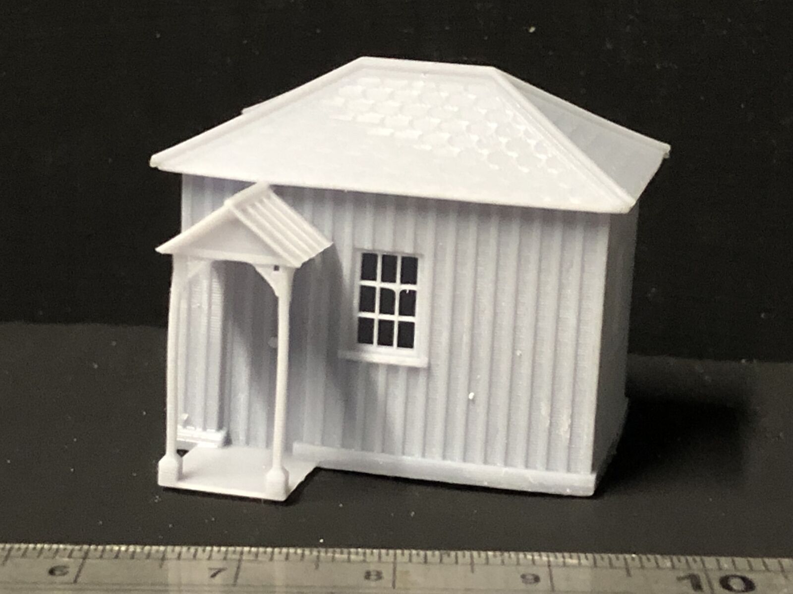 TT 1:120 scale Minffordd-style small station halt building model railway kit on a tabletop layout