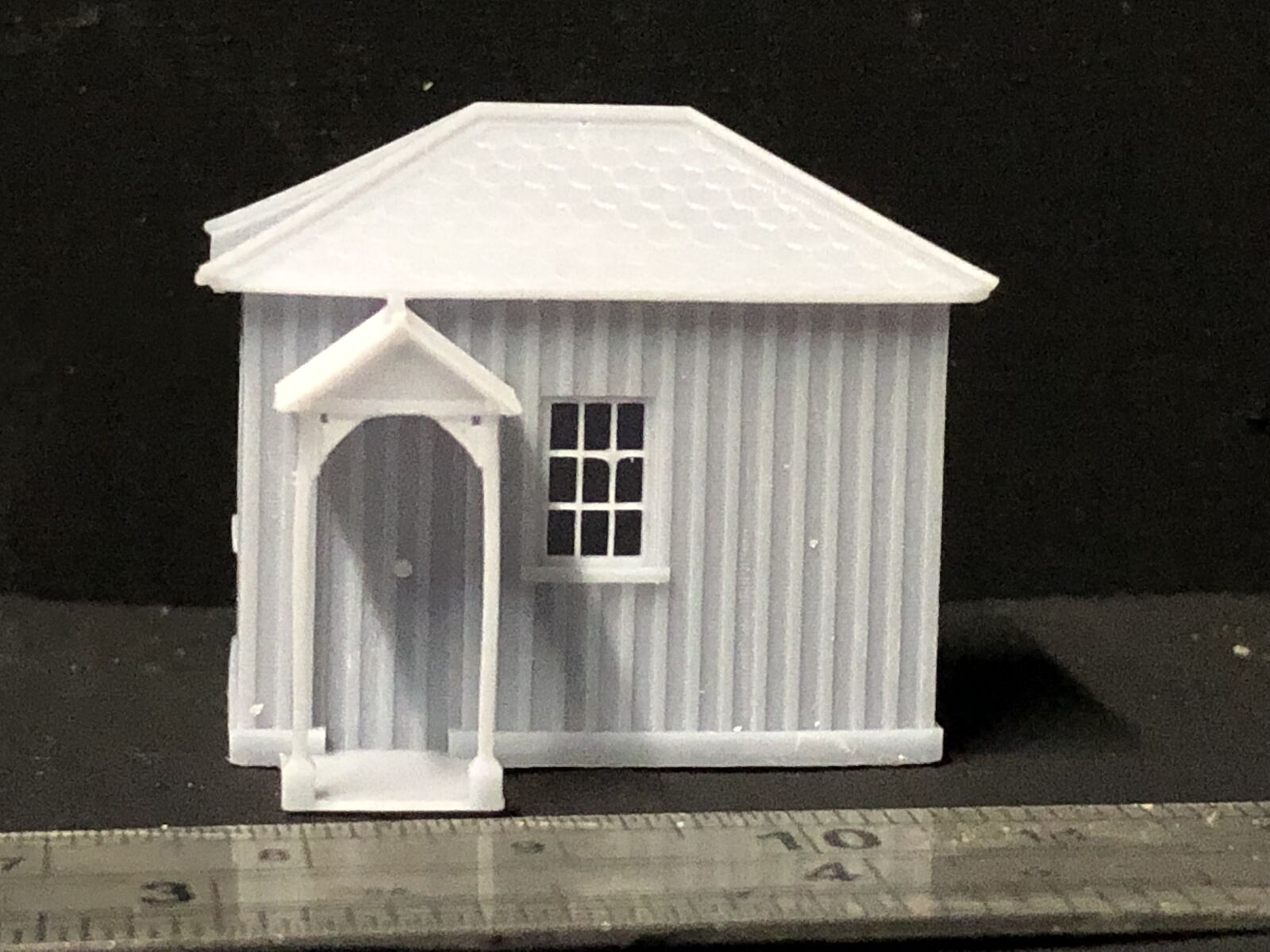 TT 1:120 scale Minffordd-style small station halt building model railway kit on a tabletop layout