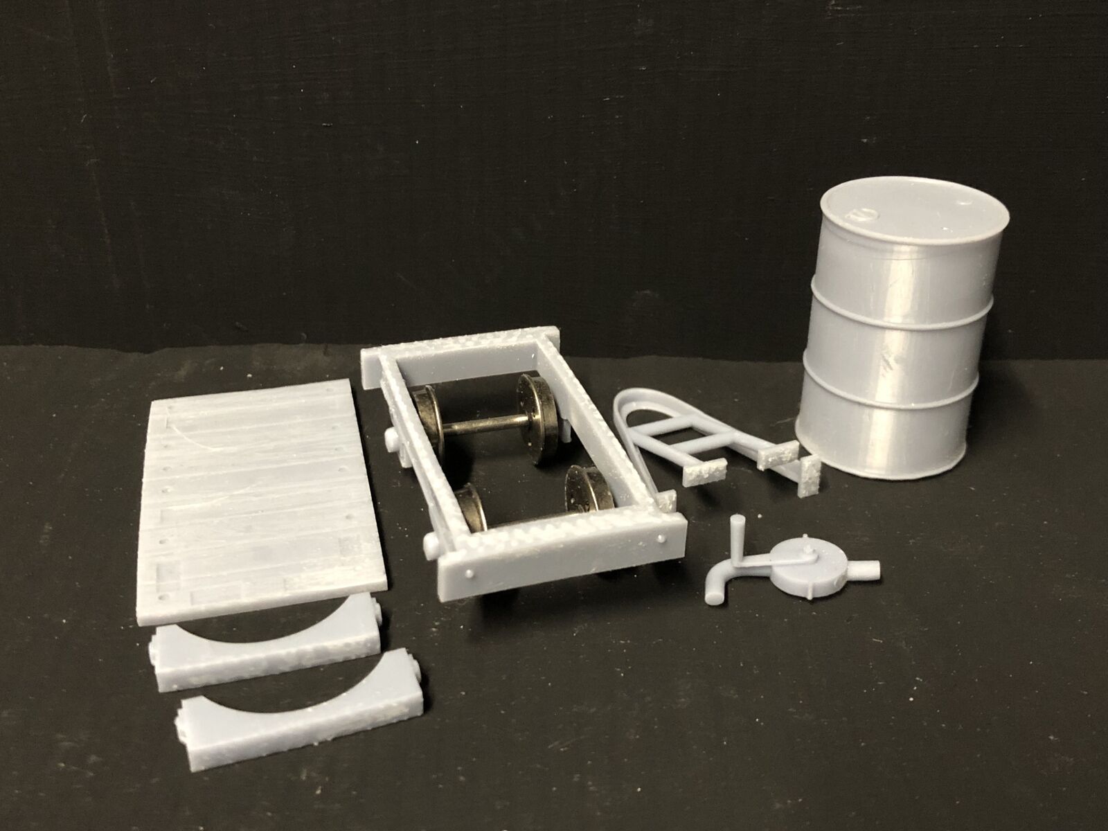 Gn15 narrow gauge petrol bowser wagon kit with single drum, pump frame and 12.5mm spoked wheels for model railway layouts