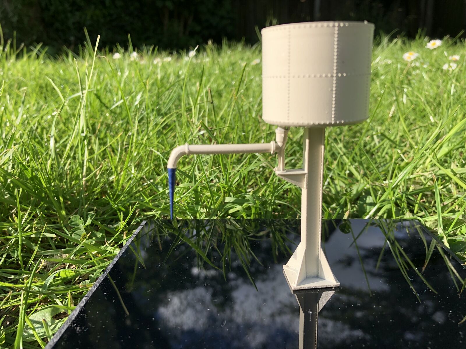 OO9 gauge GWR-style water tower kit based on Buckfastleigh, featuring an elevated tank on a detailed tower stand