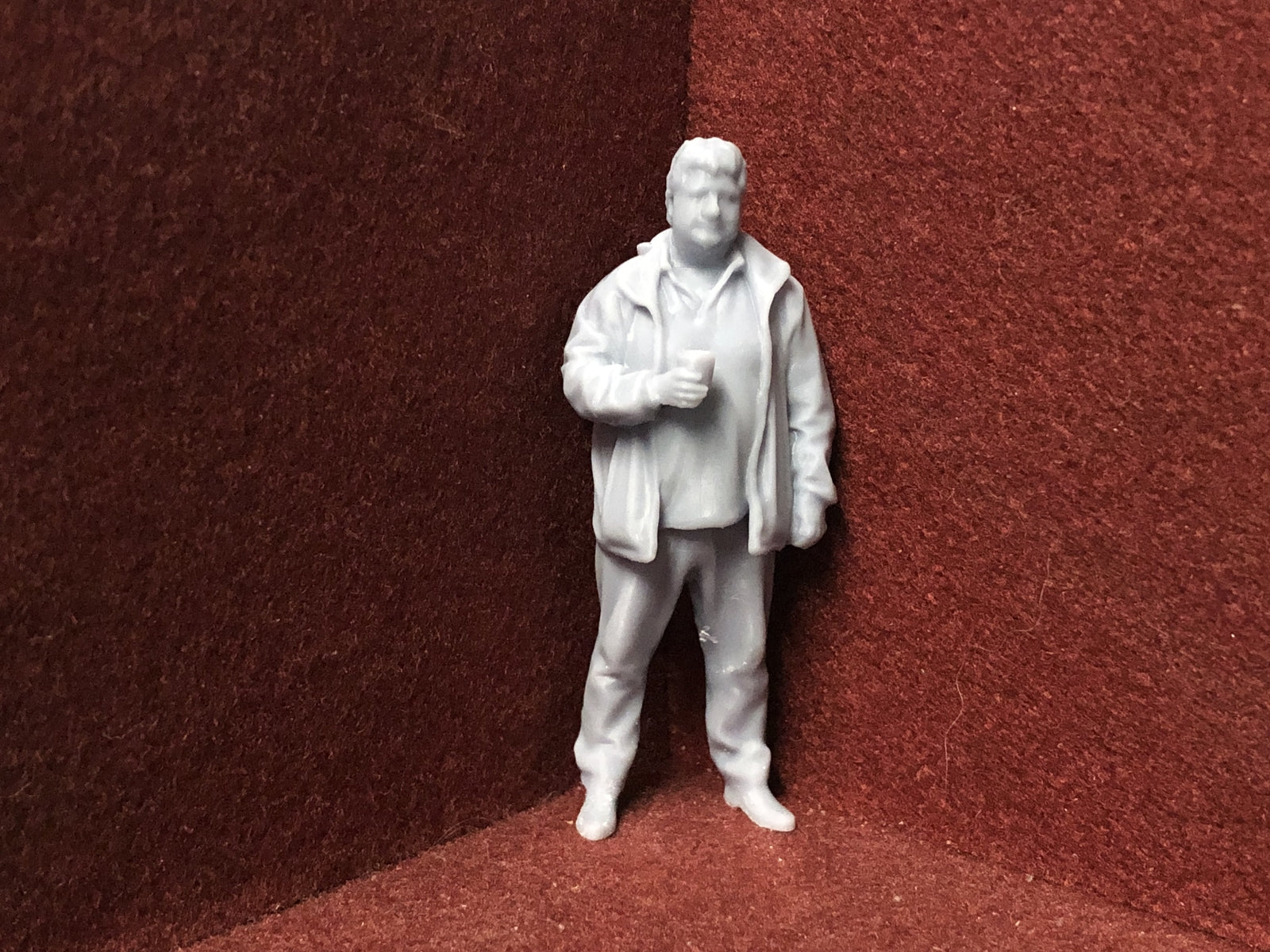 Unpainted G-scale 1:22.5 driver figure for GN15 model railways, 3D scanned from a real person, standing holding a cup of tea.