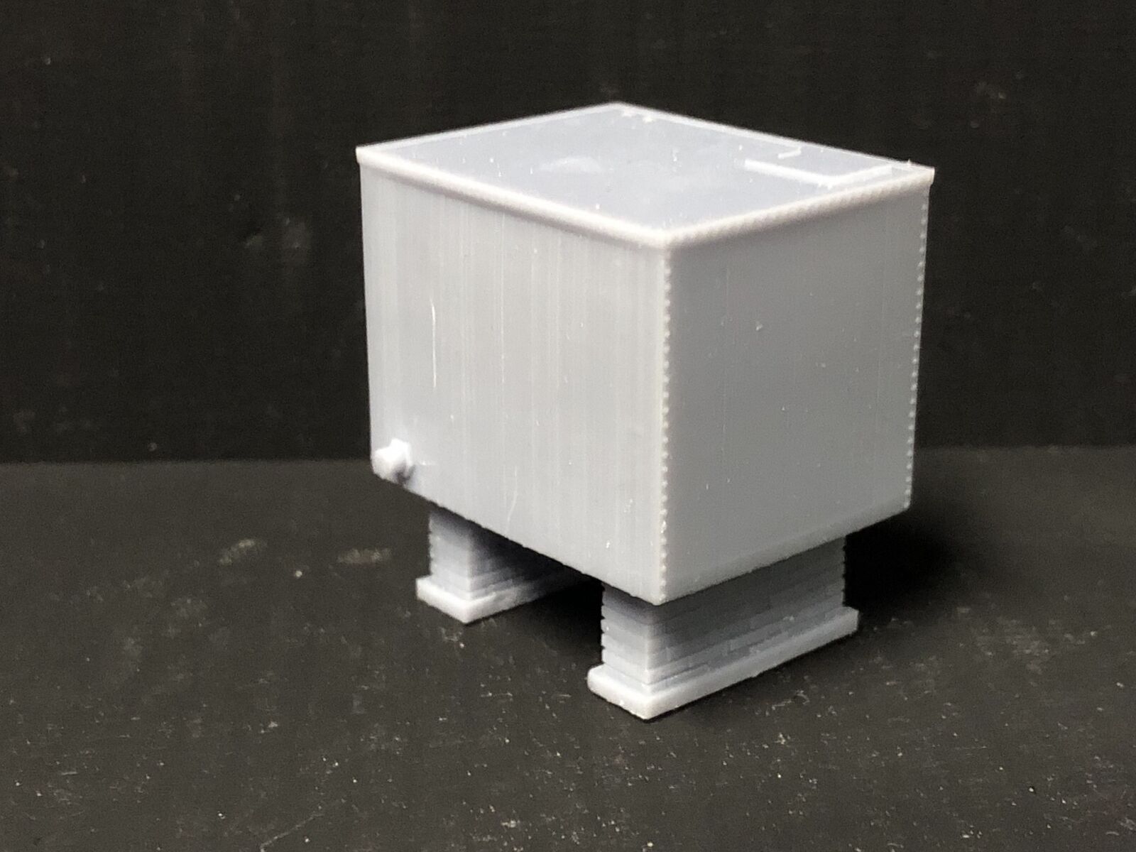 OO/HO/OO9 gauge model railway kit with two unpainted storage tanks on brick supports for depot or yard scenes