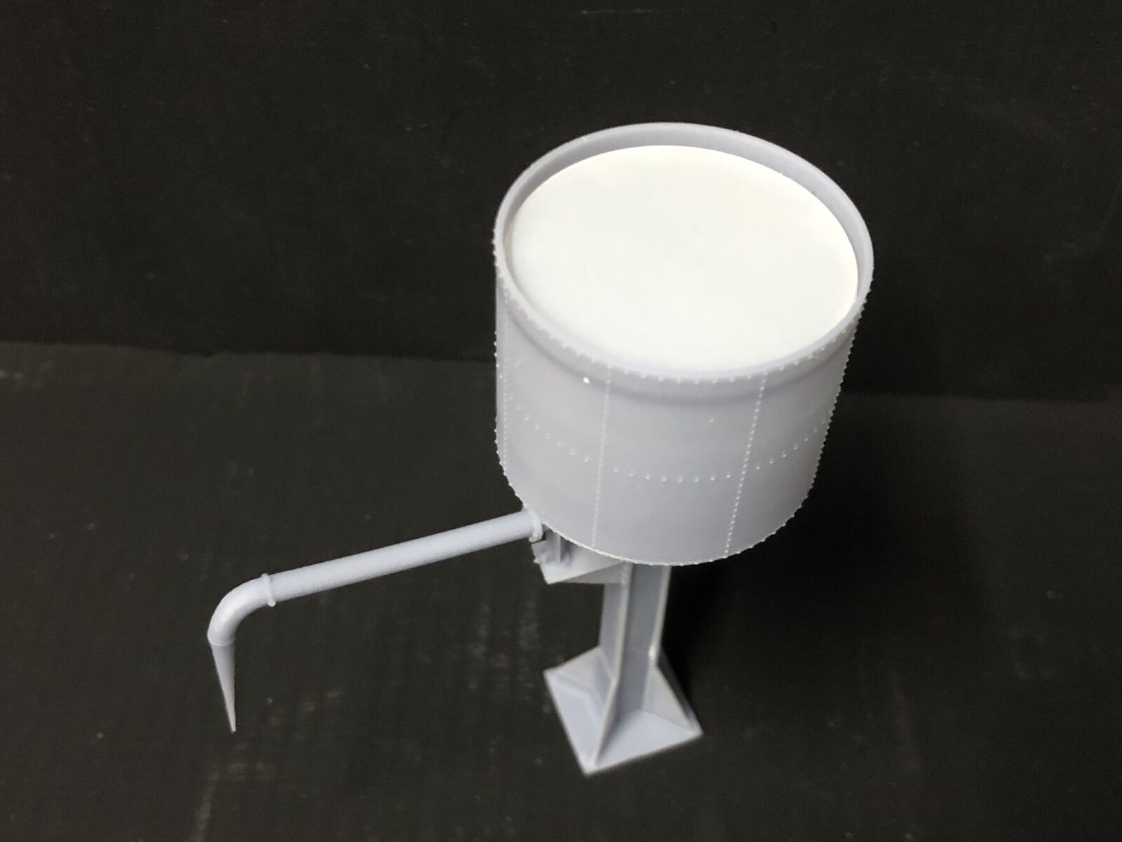 OO9 gauge GWR-style water tower kit based on Buckfastleigh, featuring elevated tank and tower stand for model railway layouts