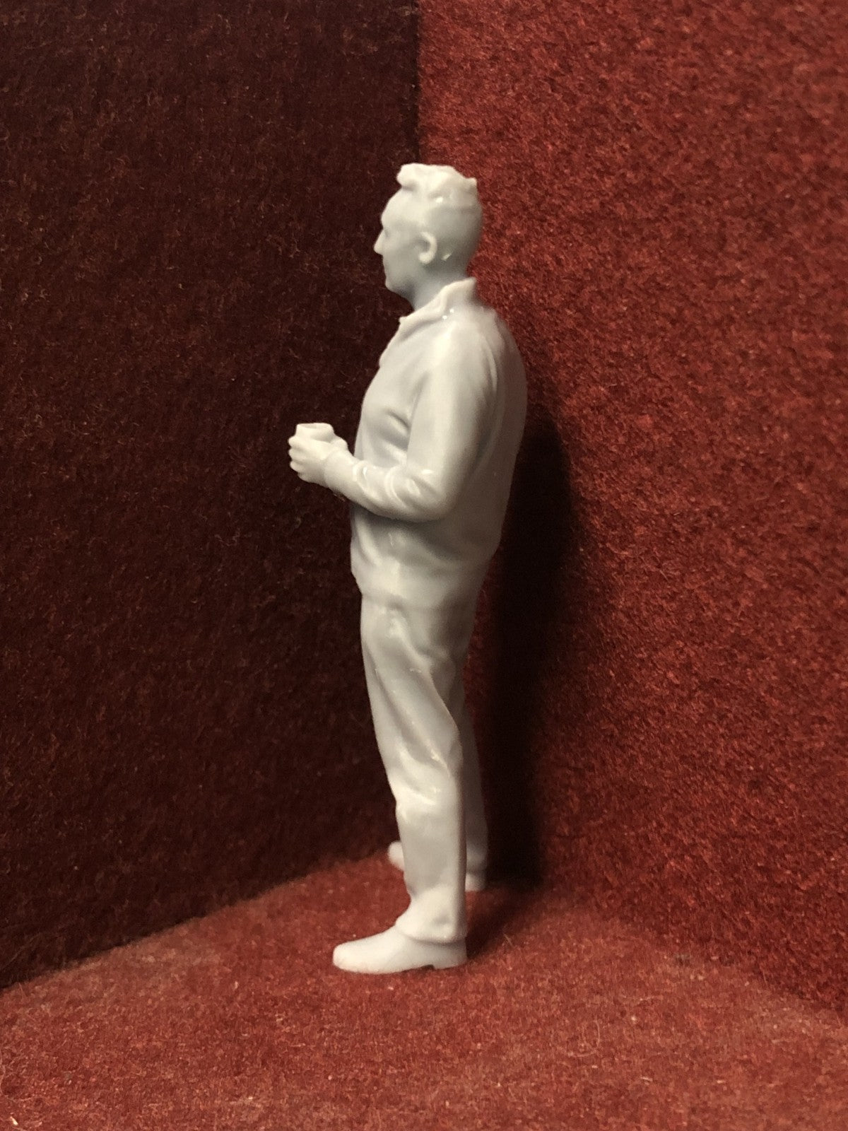 Unpainted G-scale 1:22.5 male figure holding a coffee cup, 3D scanned from a real person for model railway scenes