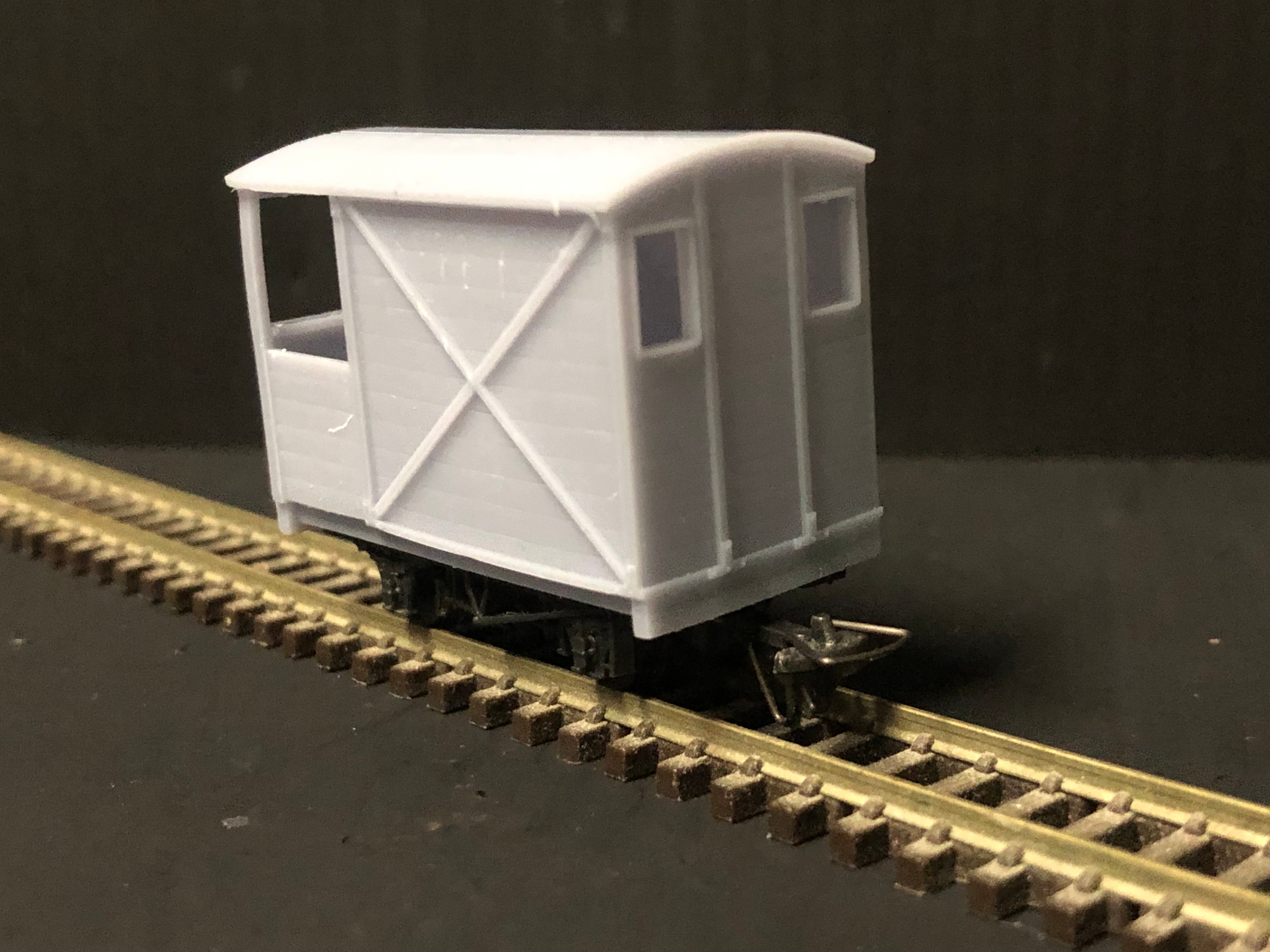 OO9 narrow gauge resin guards van body kit shown fitted to a Peco NR-121D 10ft wheelbase chassis for model railways