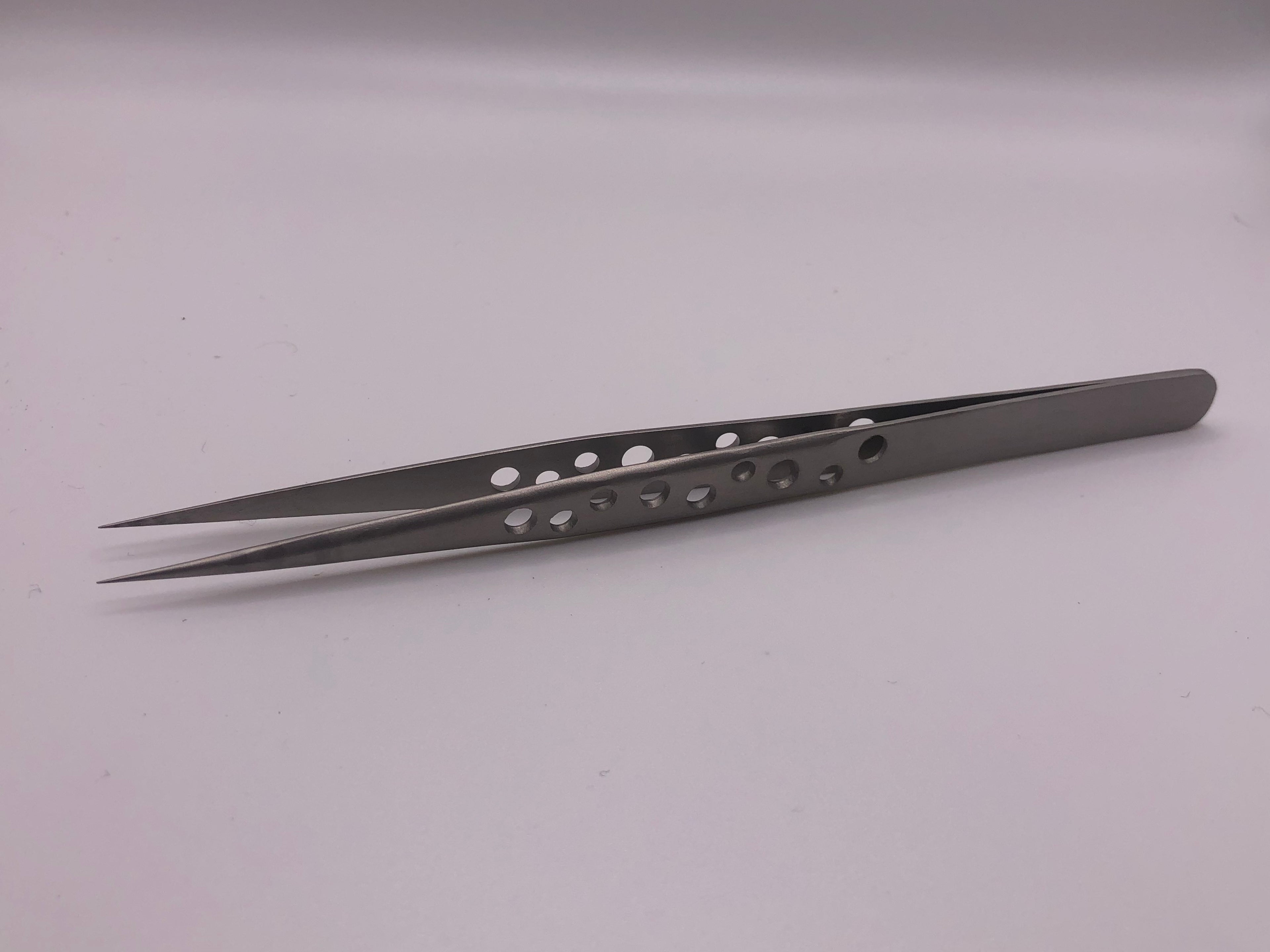 Pair of precision stainless steel straight and curved tip tweezers with drilled anti-static handles for detailed model railway work