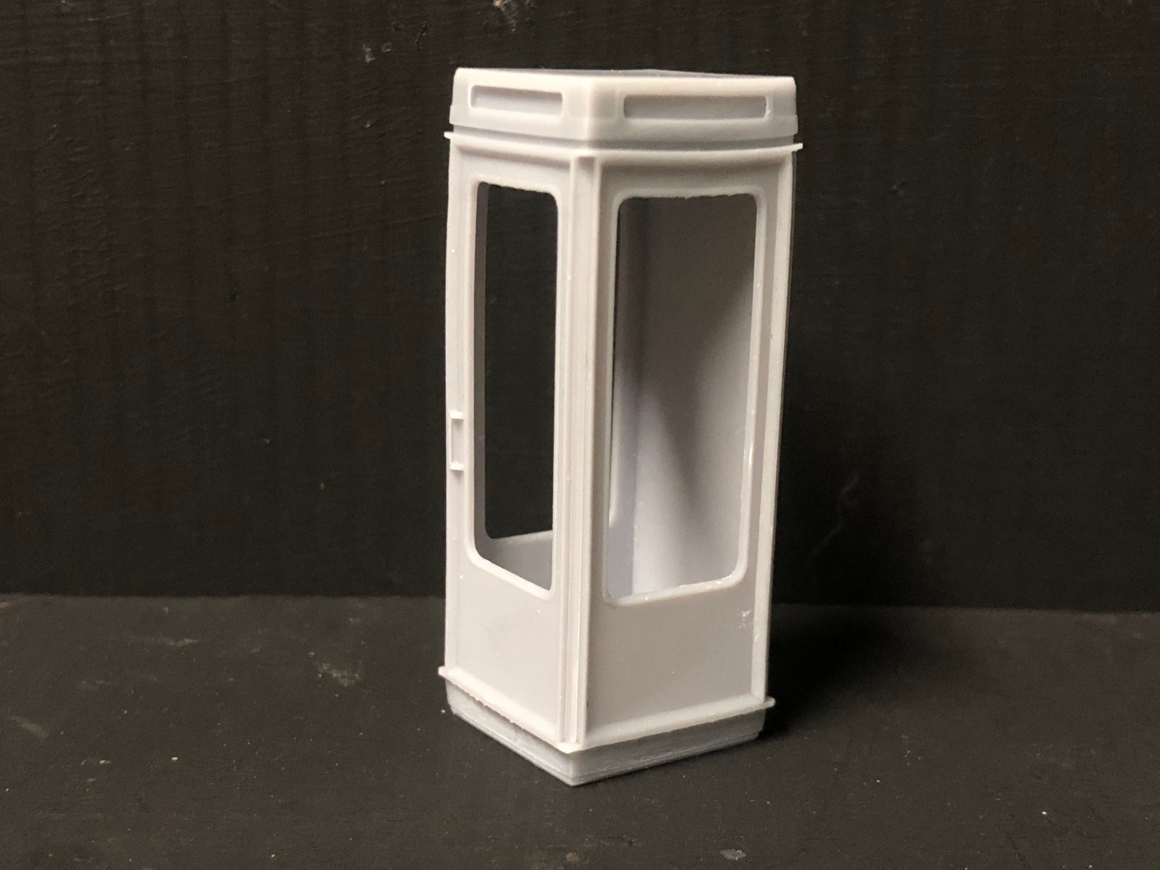 Unpainted resin K8 1970s British telephone box model kit with glazing and interior detail for NG7, 7mm scale O gauge layouts