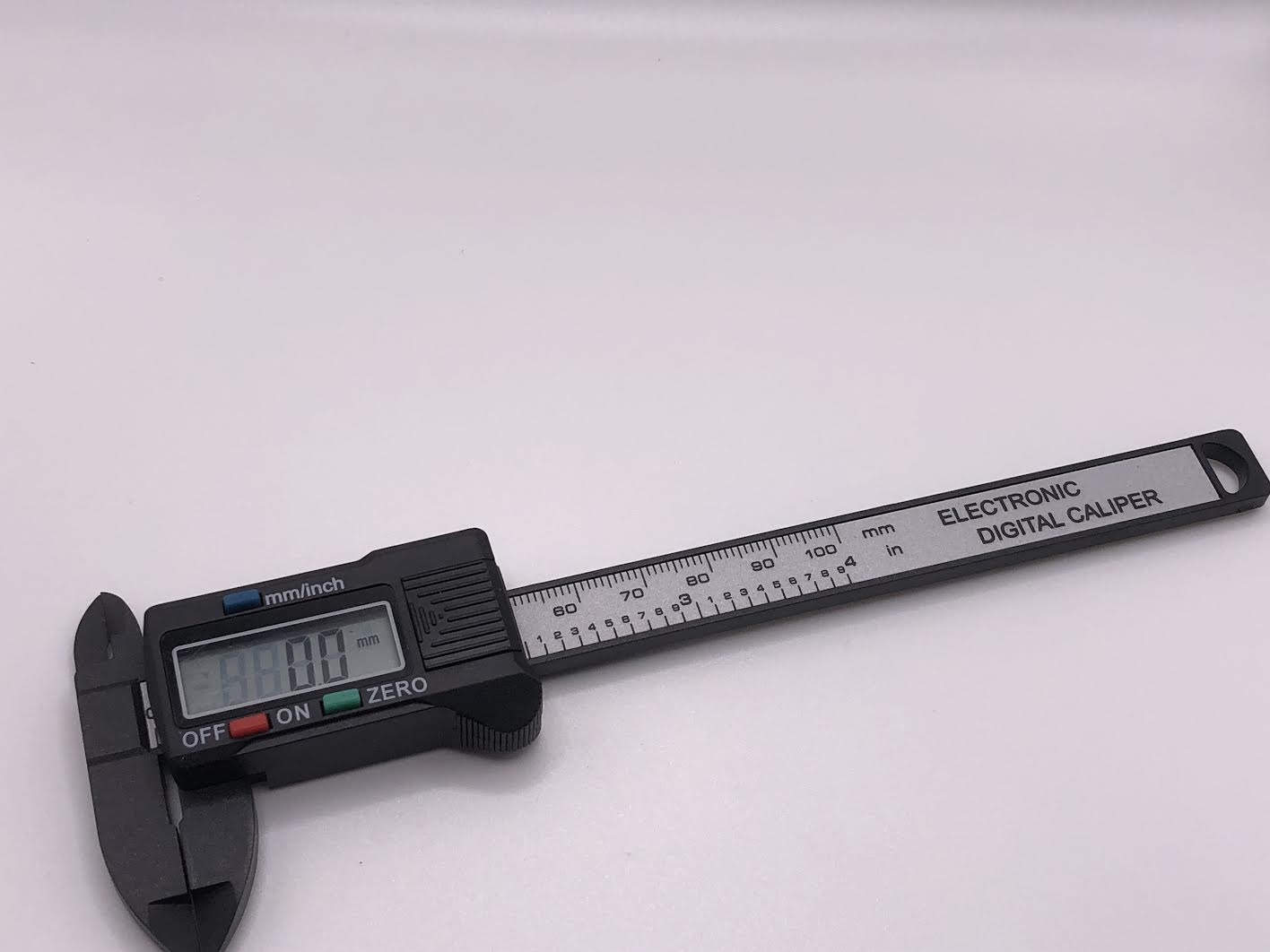 100mm digital carbon-fibre caliper measuring small model railway parts and components for accurate scale modelling