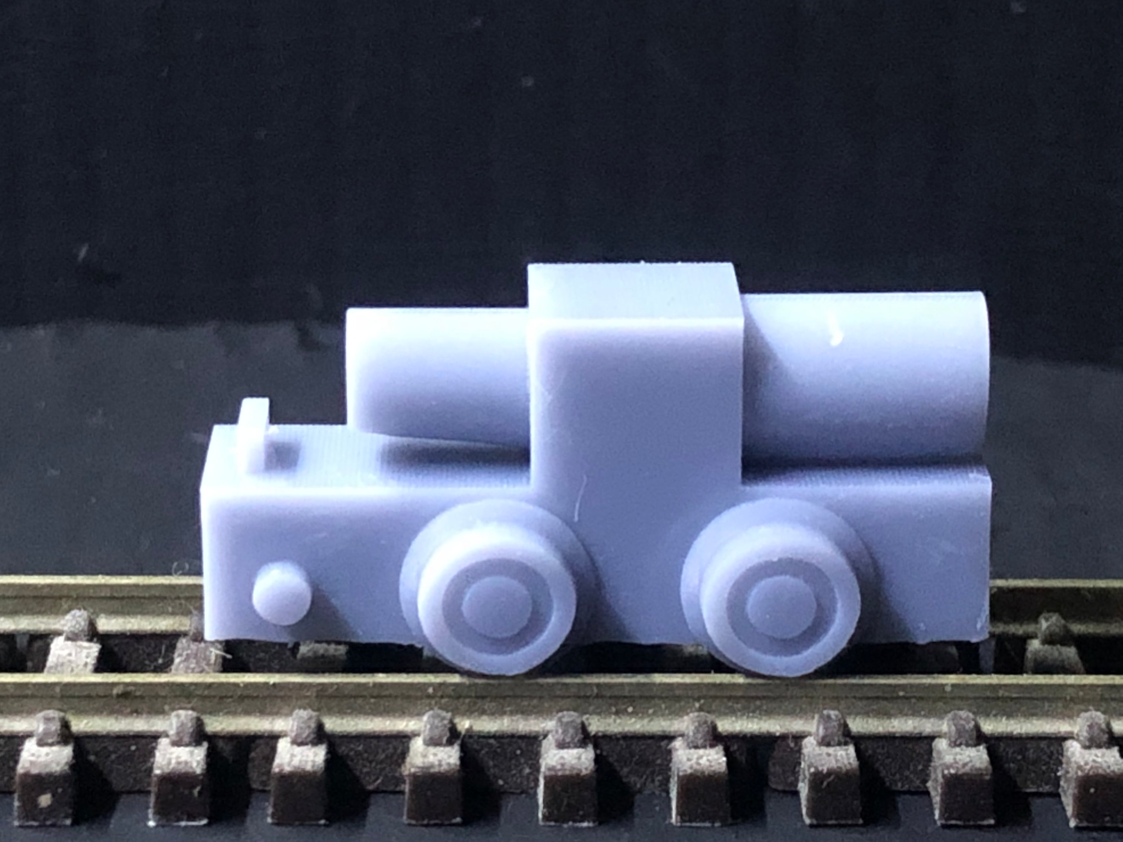 OO9 scale resin kit of a WW1 Baguley 10HP petrol locomotive with dummy chassis and 3D-scanned driver for static display