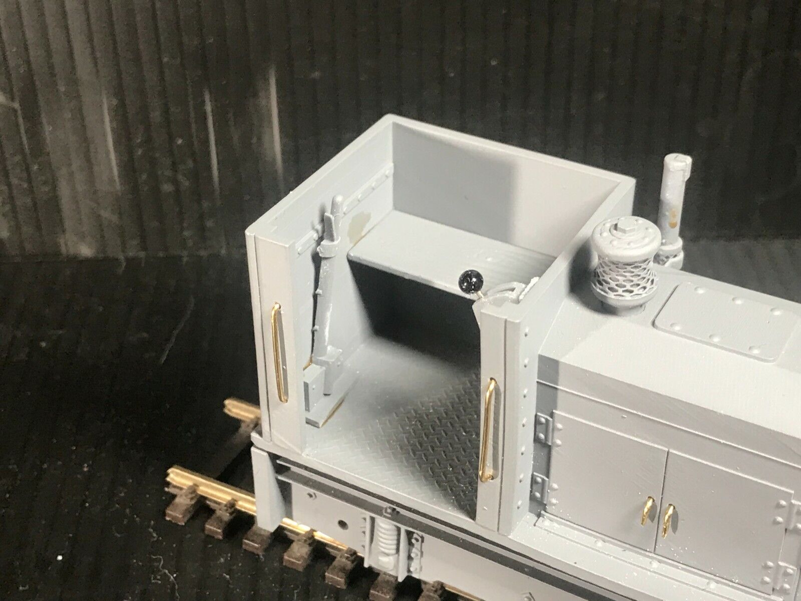 Unpainted GN15 diesel critter locomotive kit in G scale for 00 gauge track, shown on a Tenshodo spud motor bogie chassis