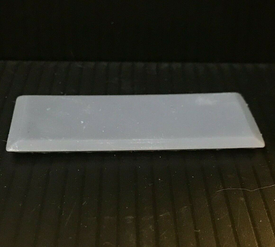 Unpainted OO9 narrow gauge prototype railbus body, roof and interior kit shown fitted to a compatible Kato 103/109/105 chassis