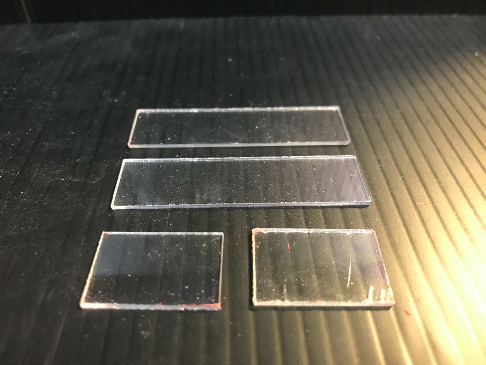 Unpainted OO9 narrow gauge French Drasine railcar body kit designed to fit a Kato 11-109 chassis, shown from an angled view