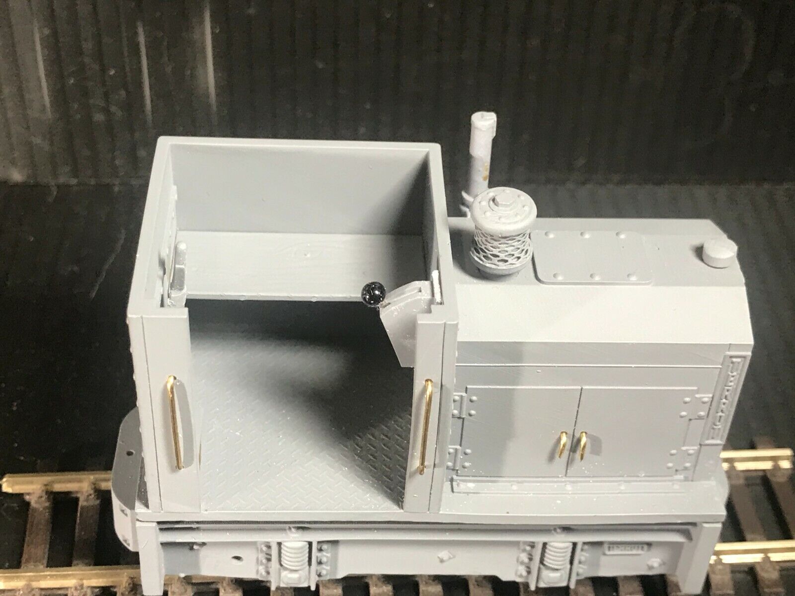 Unpainted GN15 diesel critter locomotive kit in G scale for 00 gauge track, shown on a Tenshodo motor bogie chassis