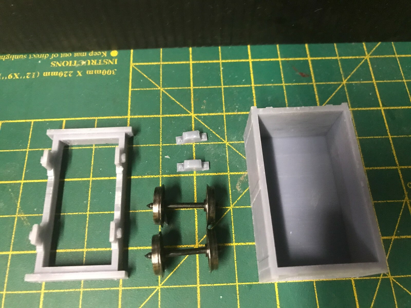 Gn15 narrow gauge drop-side plank wagon kit shown assembled on 16.5mm track with optional 12.5mm wheelset