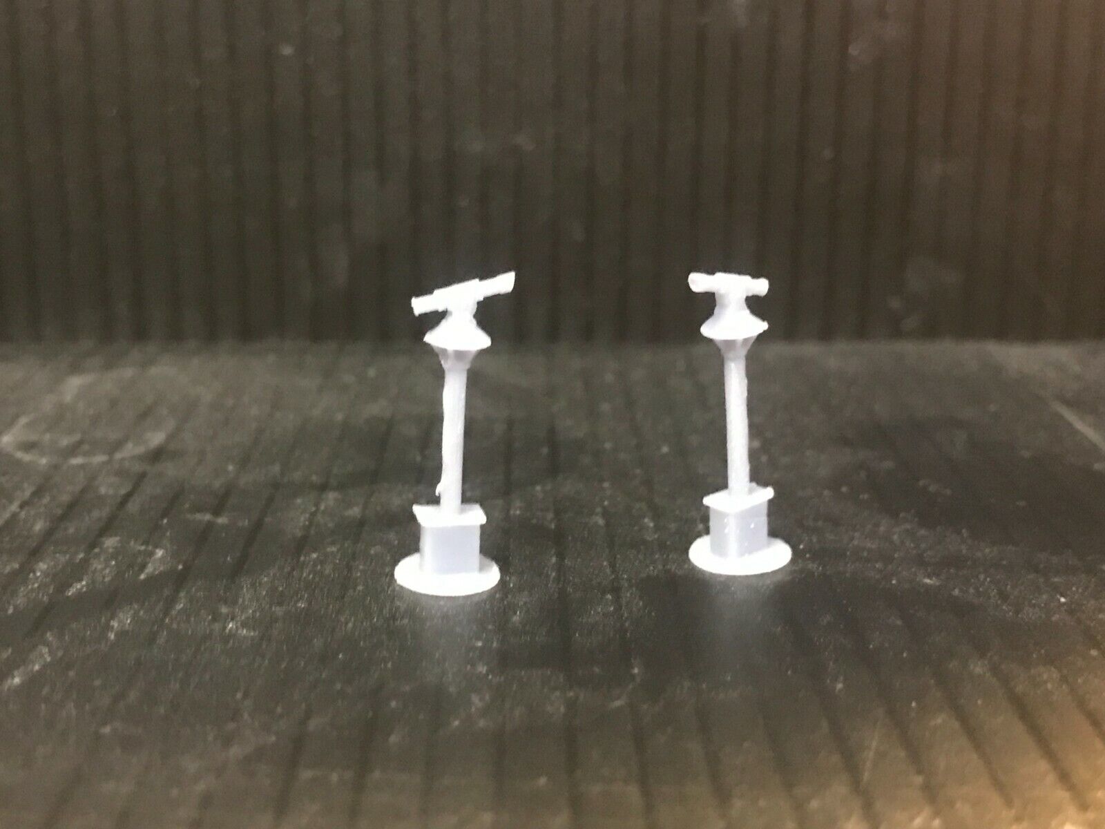 OO9 gauge Edwardian Ramsgate promenade shelter kit with charity sea mine and two seaside telescopes for model railway scenes